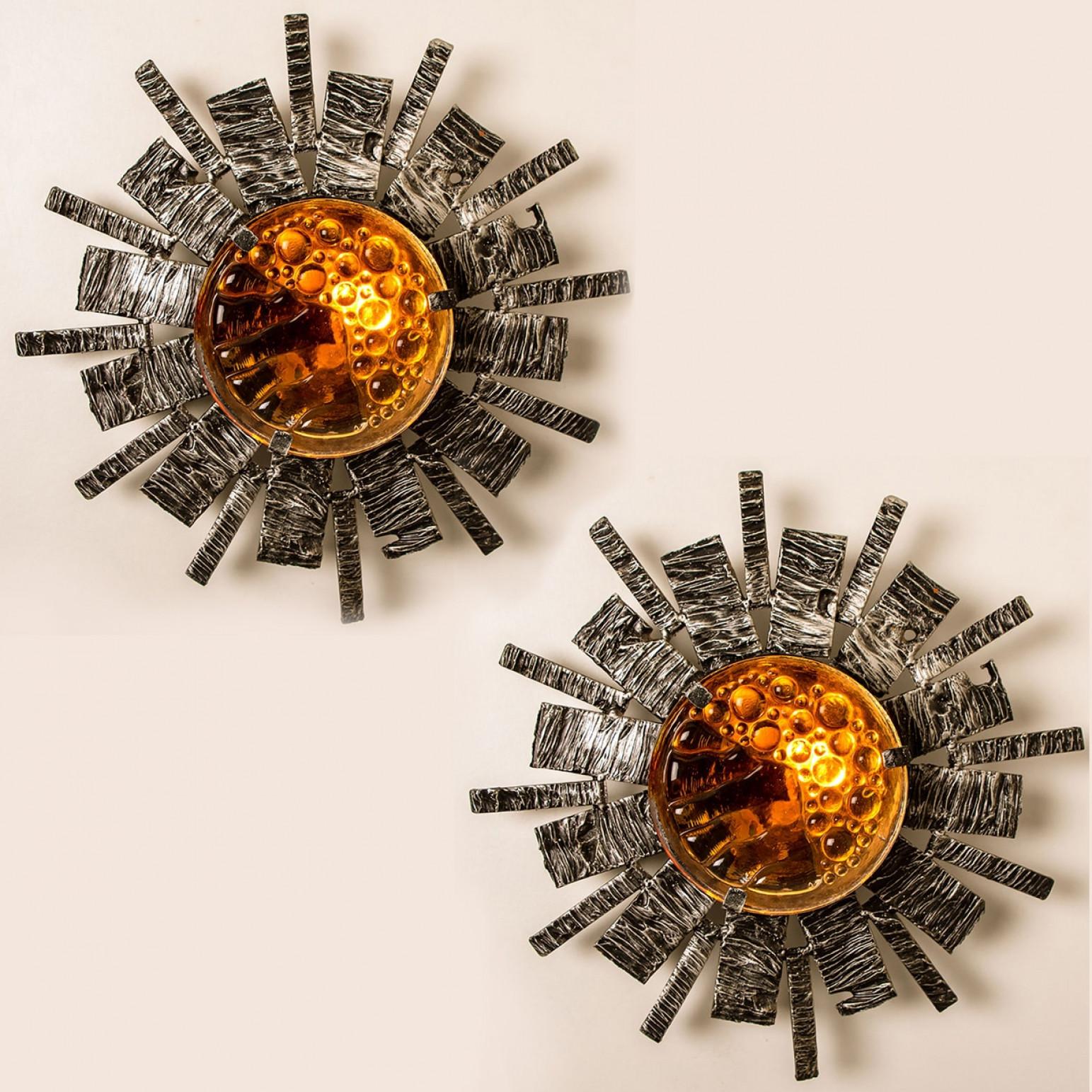 Large wall or ceiling light in wrought iron and curved granite Murano glass. Attributed to Tom Ahlström & Hans Ehrlich, Circa: 1970, Sweden

Size: Depth: 3.9 inches (10 cm), diameter: 15.7 inches (40 cm)

In very good condition and ready to use. The