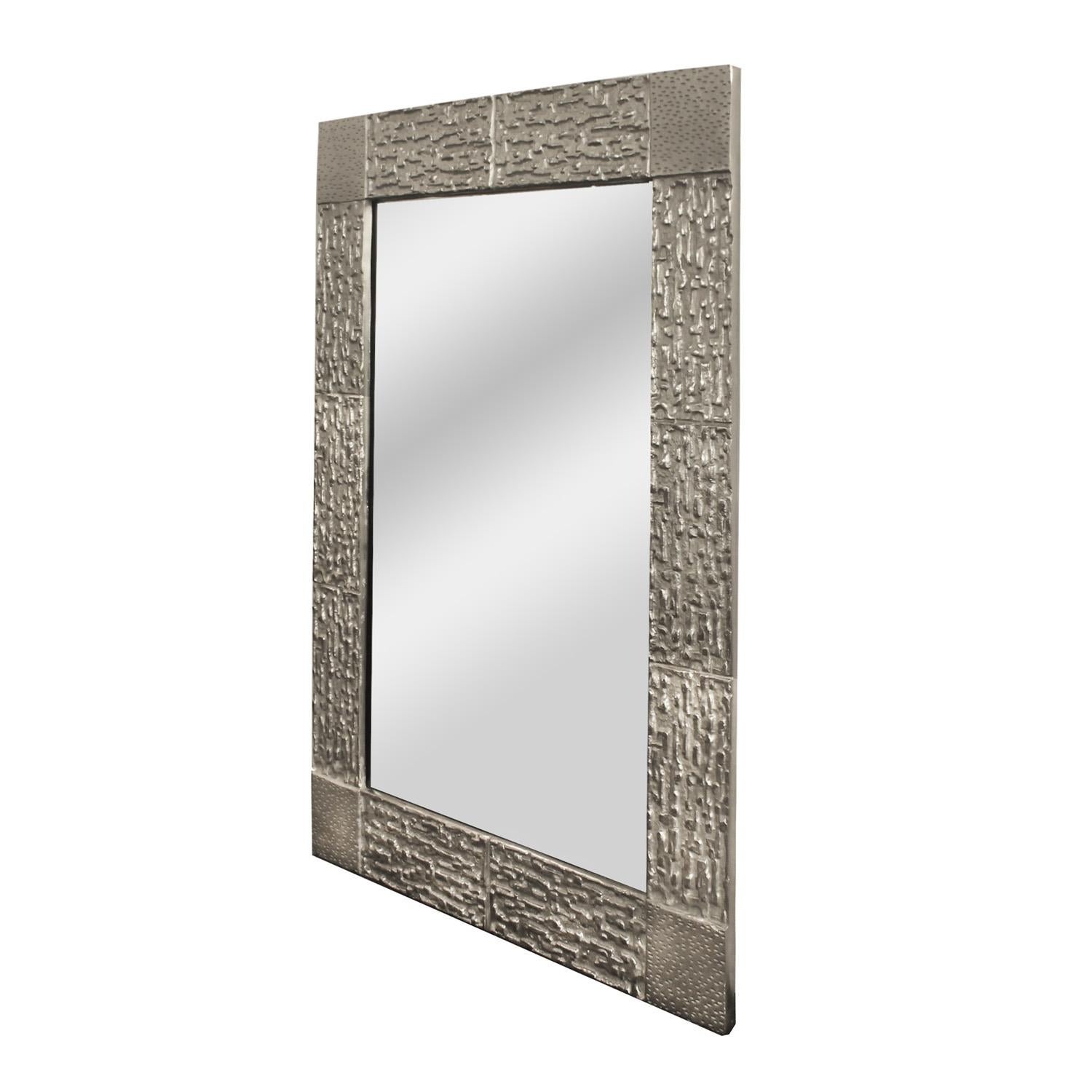 Striking Brutalist wall mirror in the style of Luciano Frigerio in brushed nickel with clear glass. American, 2022

 Customization of size, finish and mirror are available. 8-10 week lead time.