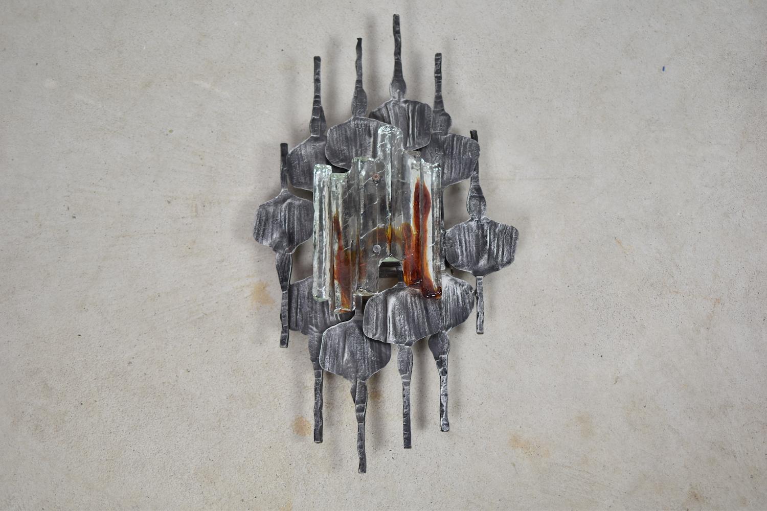 Wonderful midcentury Brutalist wall sconce designed by Tom Ahlstrom and Hans Ehrlich, Sweden, 1960s. Nice Brutalist shape with a unique Murano glass. Excellent condition.