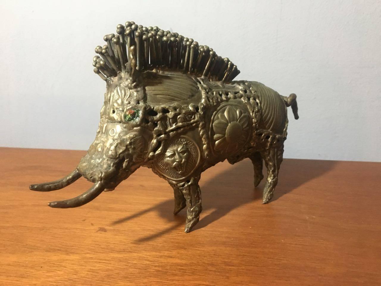 Bronze sculpture by Pal Kepenyes, Brutalist wild board.

A sculptor from Hungary who was nationalized Mexican, Pal Kepenyes resides in Acapulco where he has a studio. In his sculptures we can appreciate romantic, ludic and social representations of