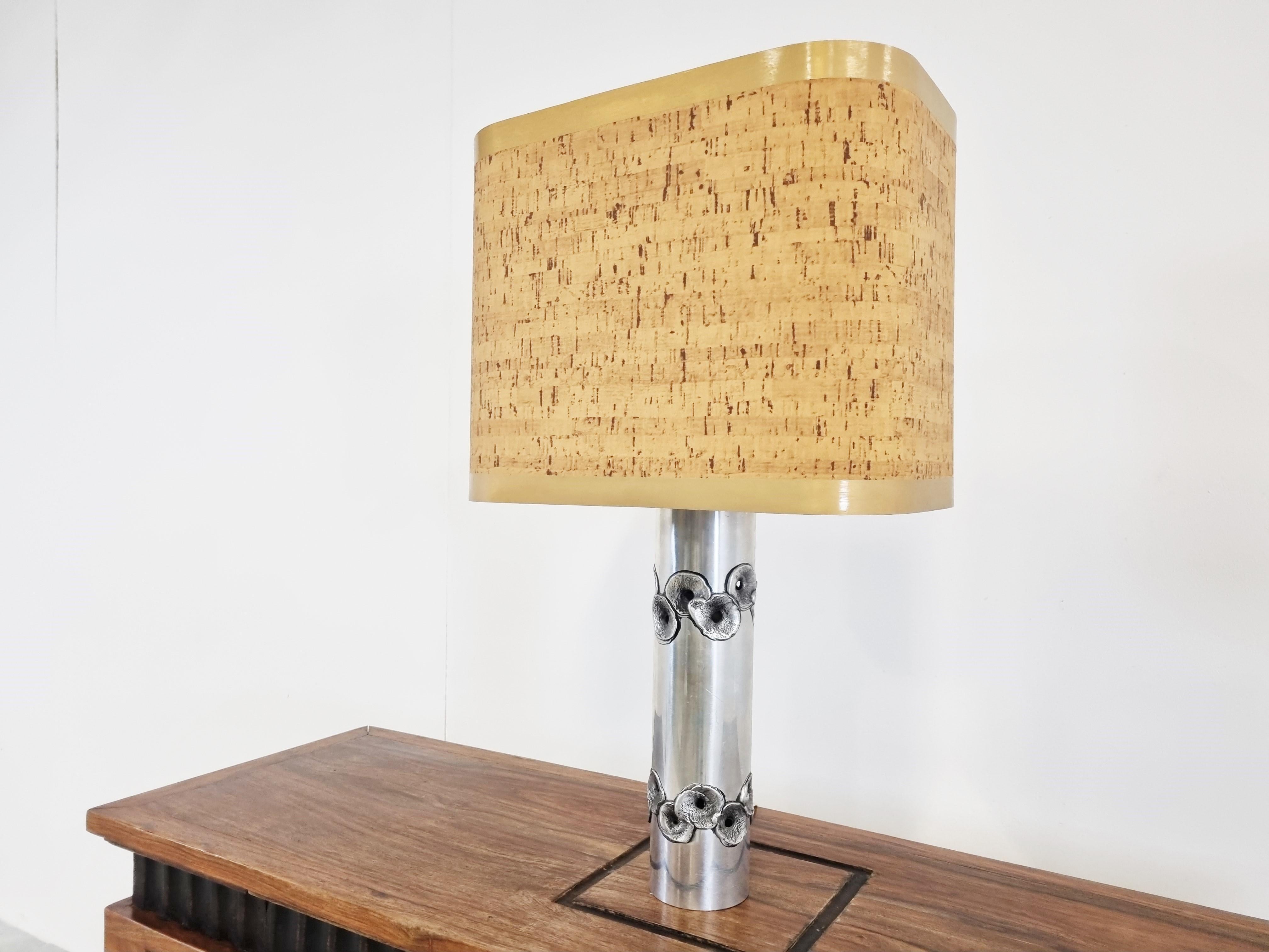 Stunning brutalist table lamp made from cast aluminum.

This lamp was made by belgian goldsmith Willy Luyckx for a belgian company called Aluclair.

Willy Luyckx was a goldsmith who worked for goldsmith Camille Colruyt before starting his own