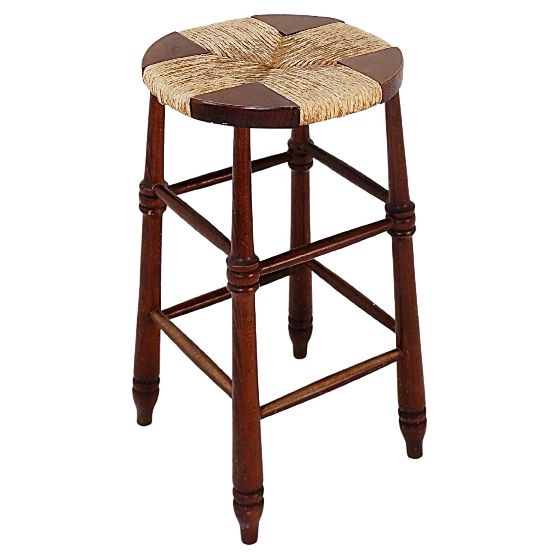 Tabouret brutaliste en bois et paille de riz - 1970