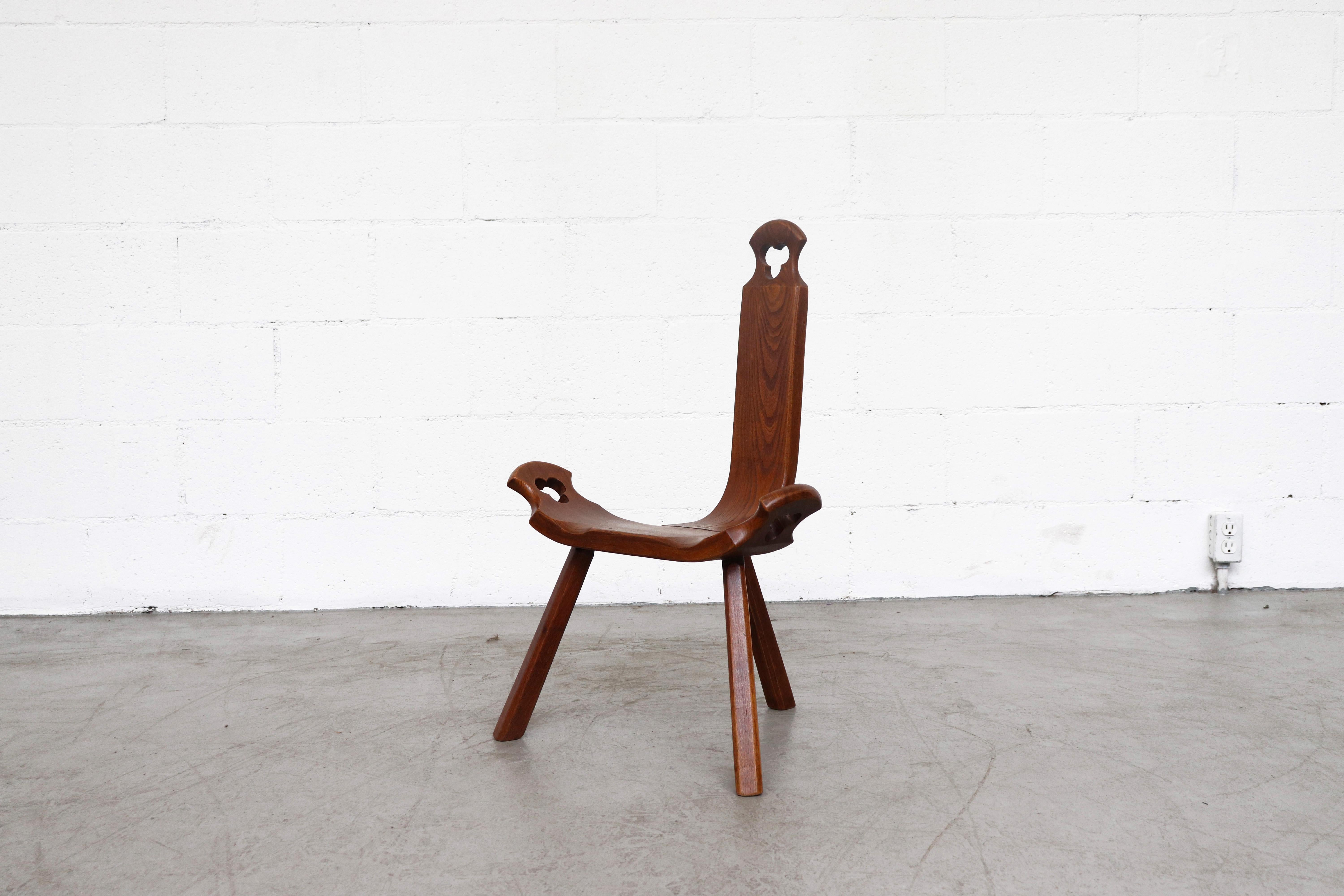 Mini Brutalist wood tripod chair with cut-out detail. Deceivingly comfortable three-legged and three-paneled seat create an amazing Silhouette. In original condition with some signs of visual wear consistent with age and use.