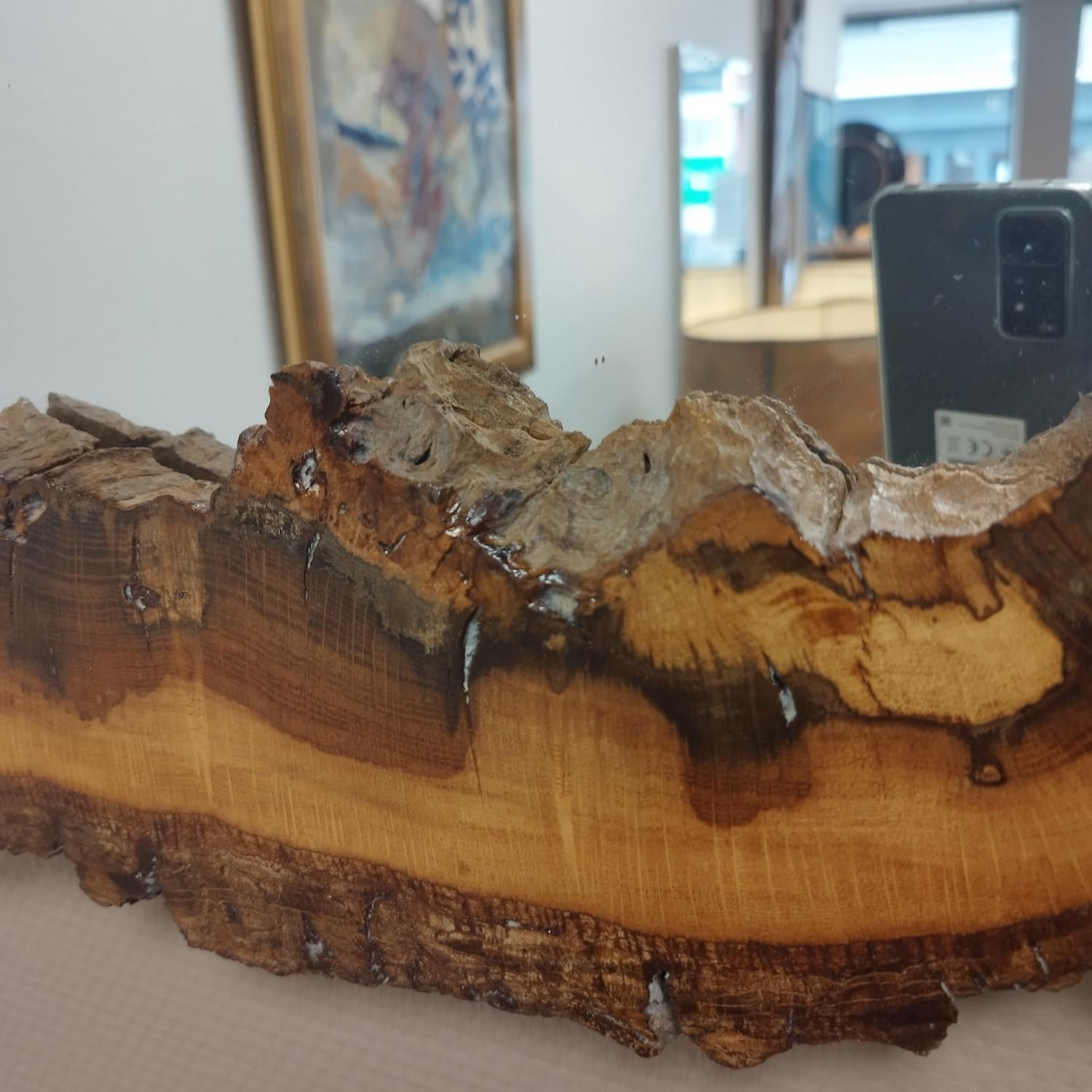 Brutalist wood mirror from the 1970's, France. Made out of one slice of a trunk.

Do not hesitate to contact me for a shipping quote.