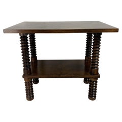 Brutalist wood turned wine press side table in the style of Charles Dudouyt