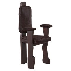 Brutalist wooden armchair reupholstered in ponyhair, France 1970s. Two available