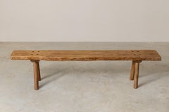 Brutalist Wooden Bench with Riveted Construction