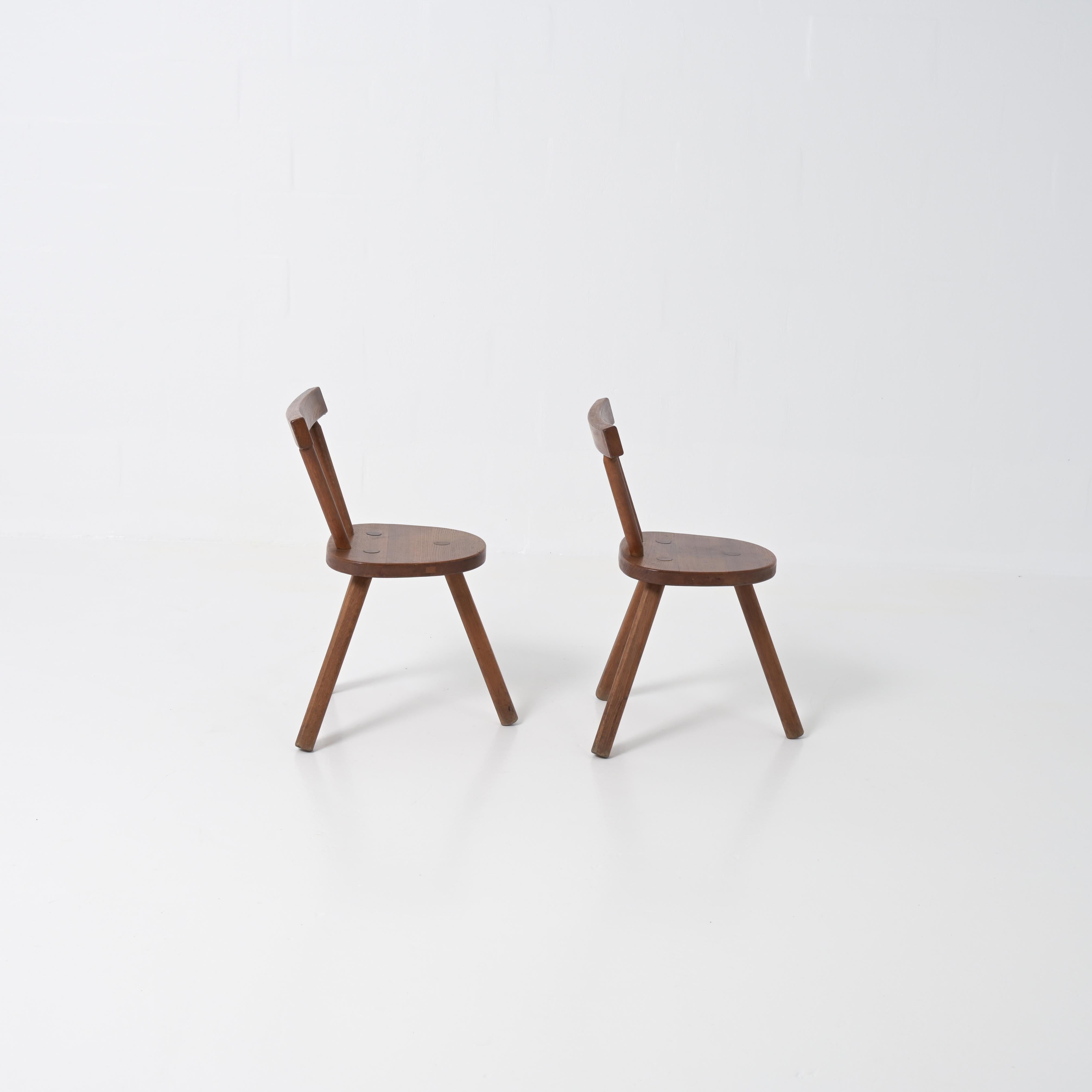 Mid-Century Modern Brutalist wooden chair in the style of Jean Touret