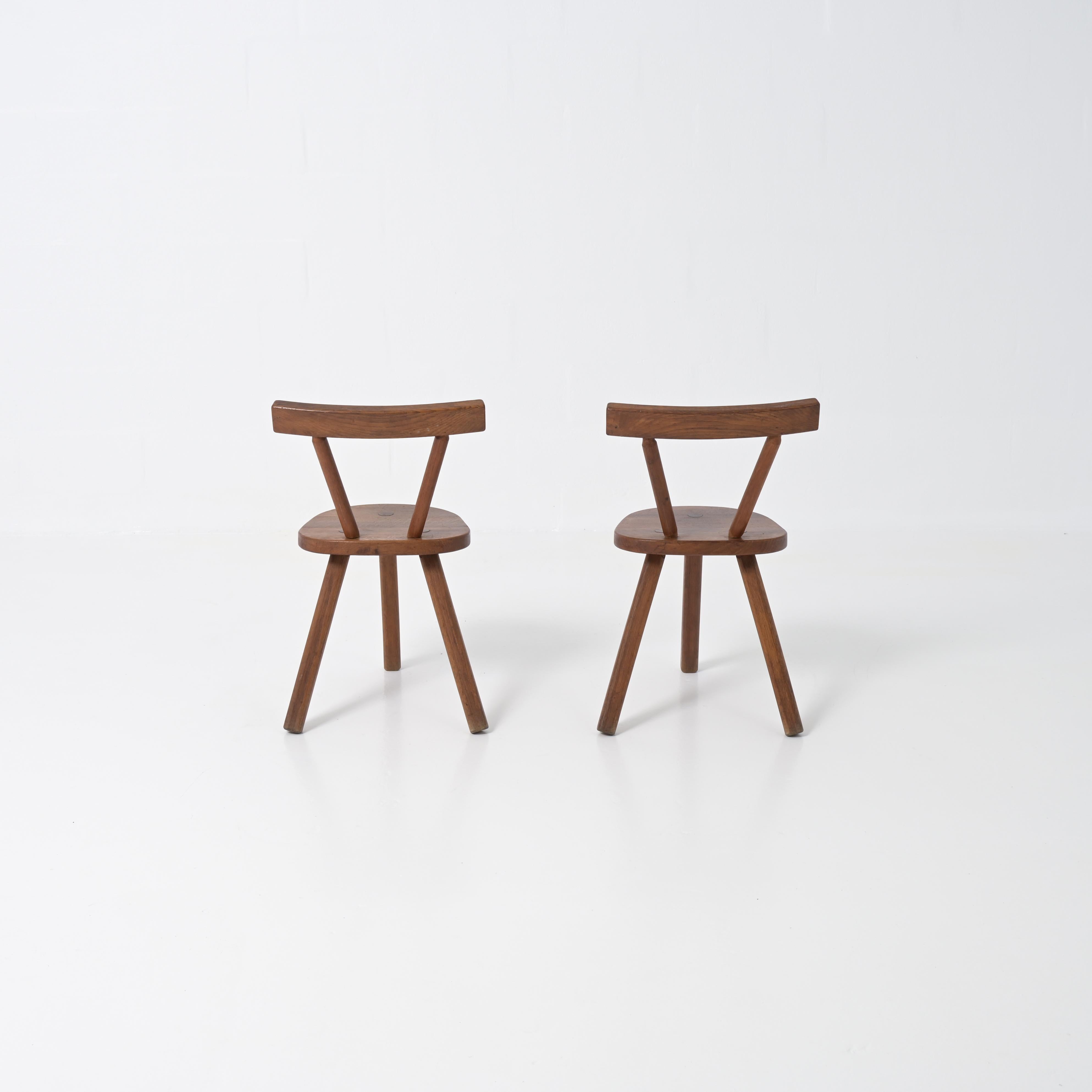 European Brutalist wooden chair in the style of Jean Touret