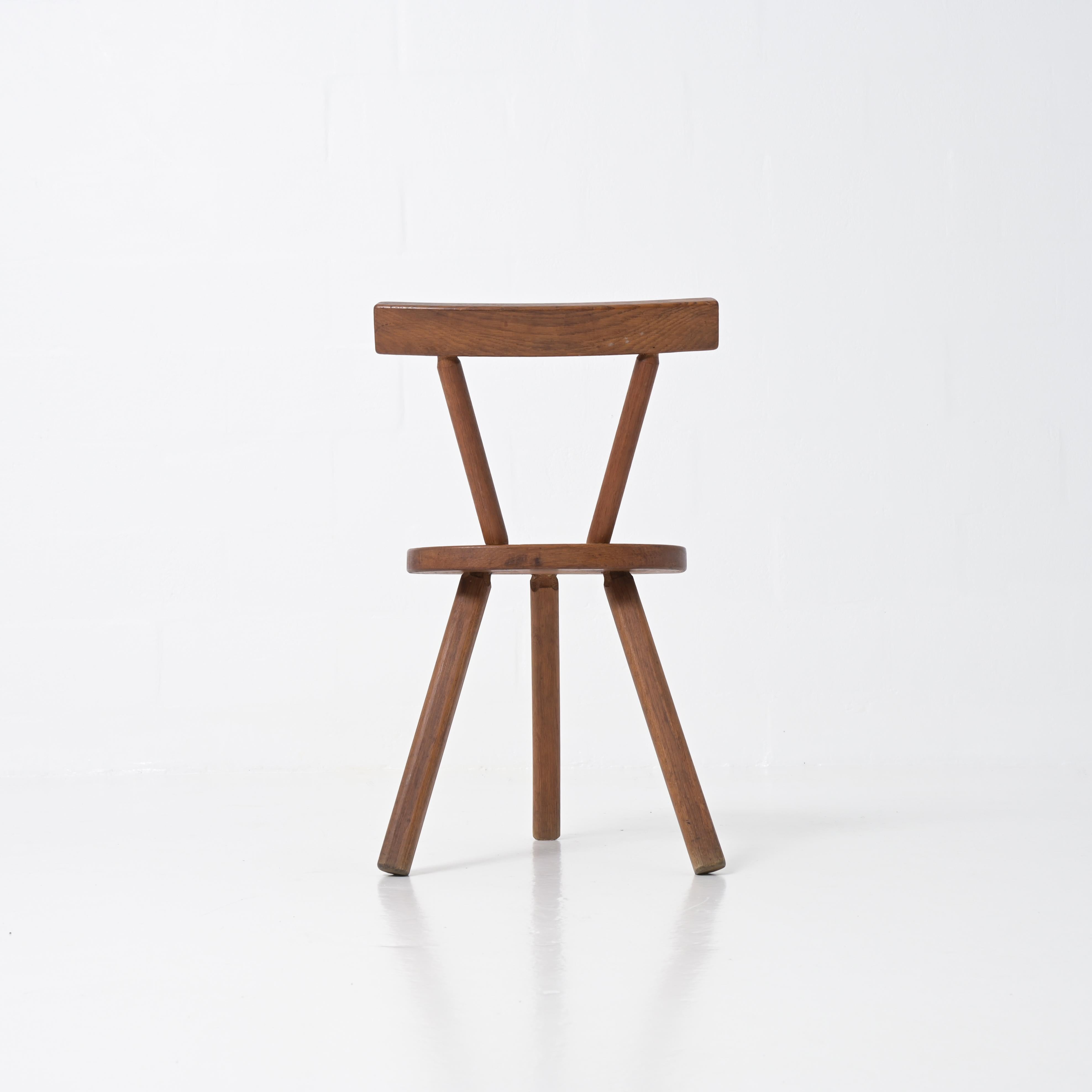 Wood Brutalist wooden chair in the style of Jean Touret