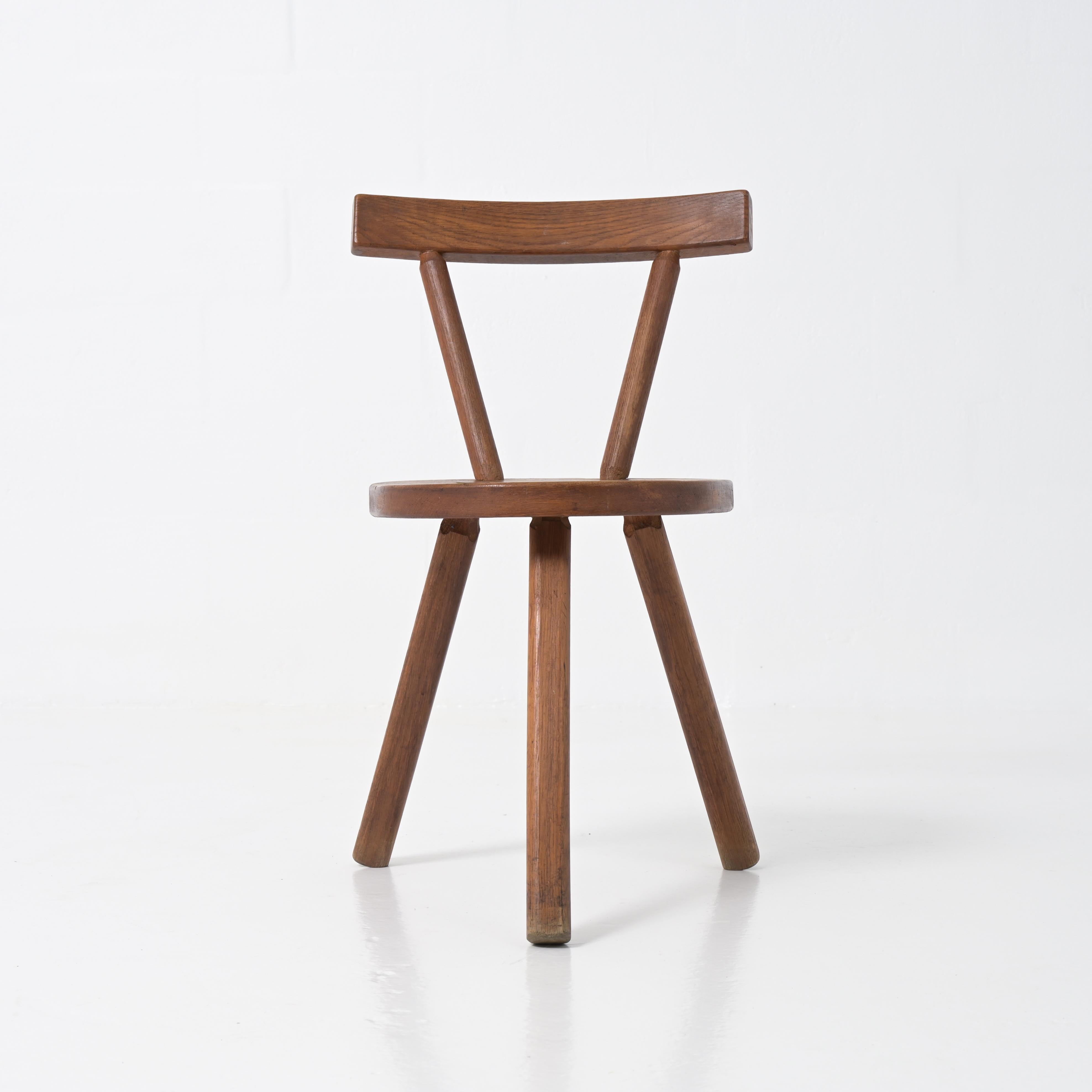Brutalist wooden chair in the style of Jean Touret 1