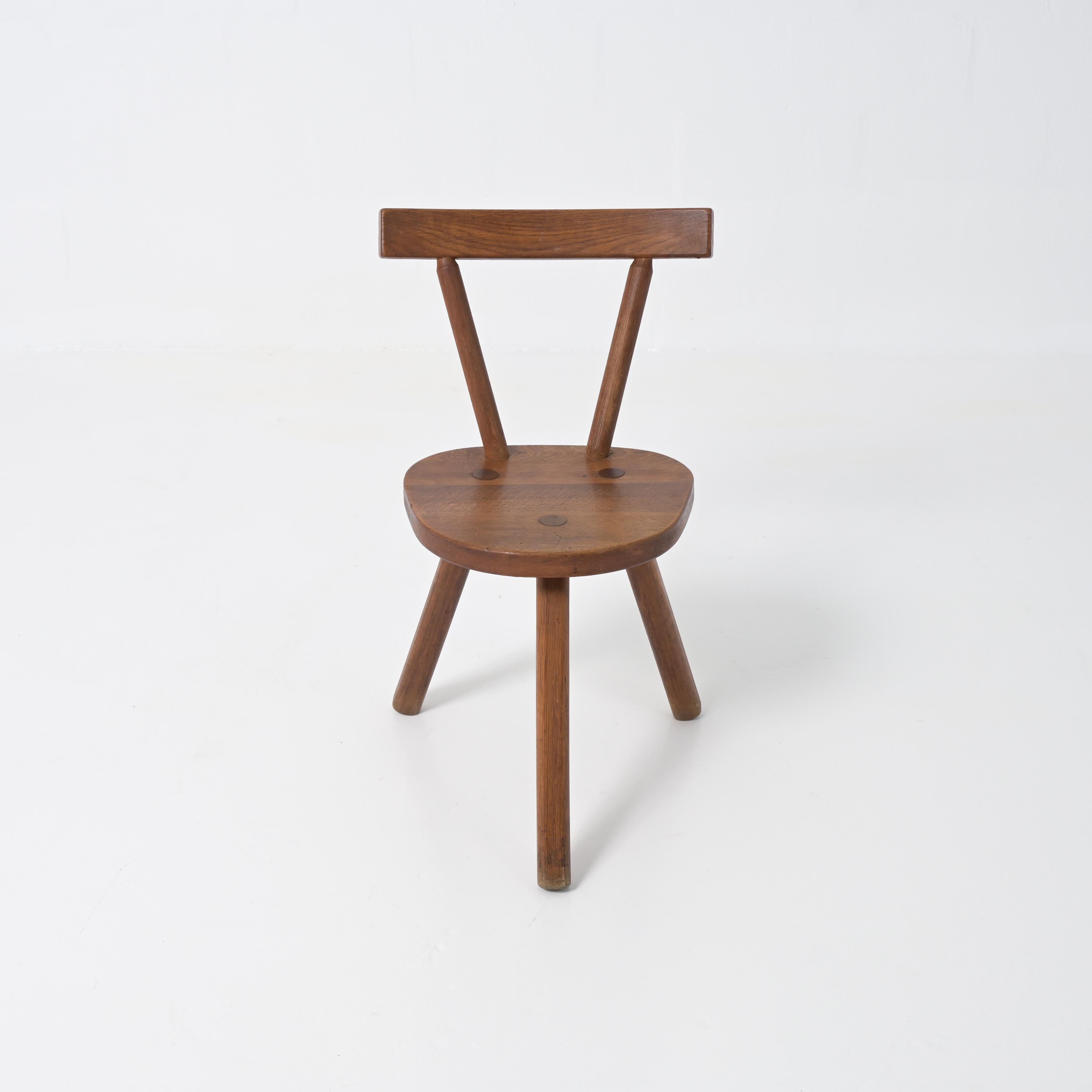 Brutalist wooden chair in the style of Jean Touret 2