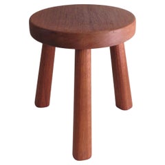 Brutalist wooden tripod stool with flared legs, France 1960