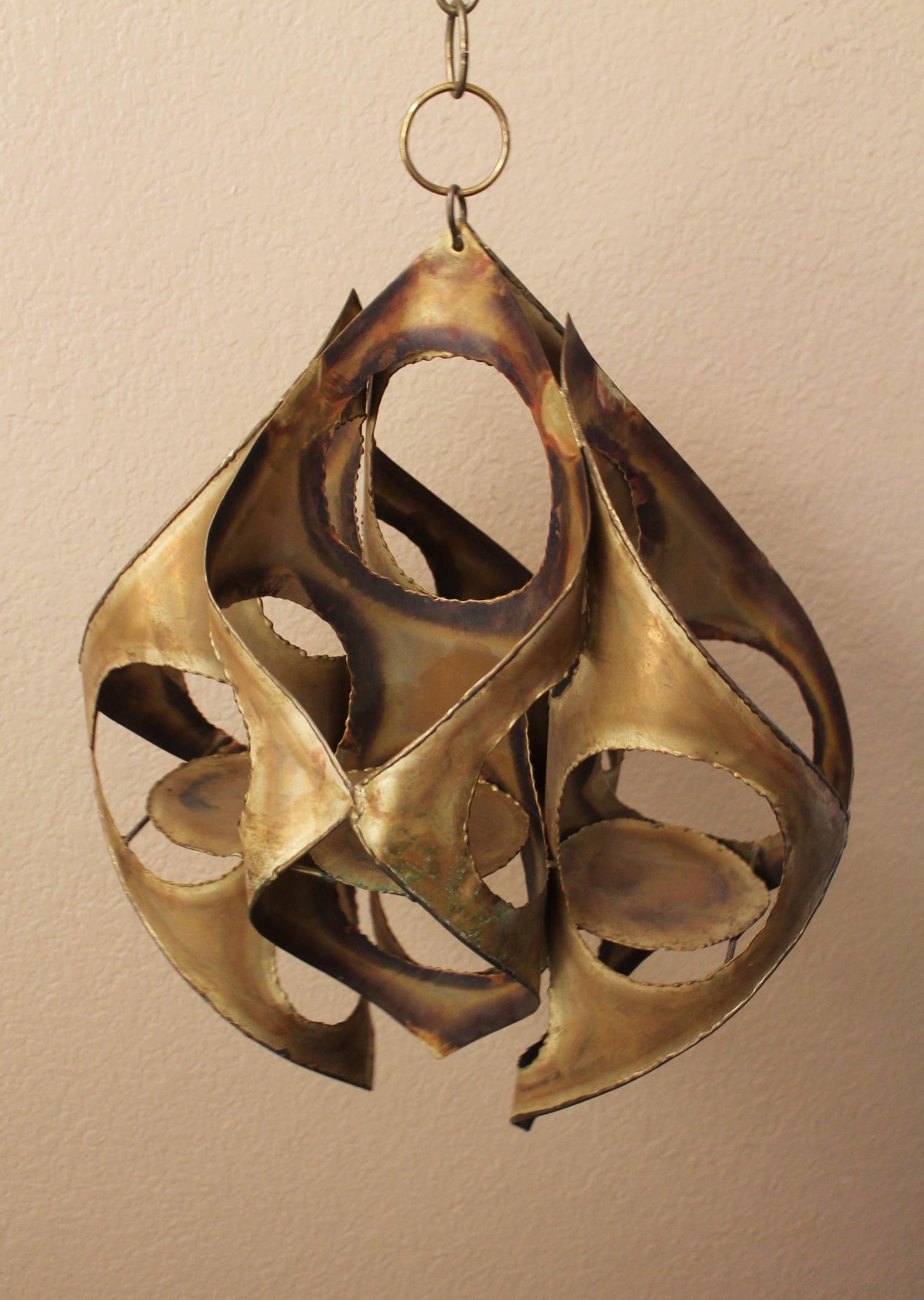 Stunning!

Brutalist Hanging Candle Lamp
Worked Metal
After Curtis Jere

Circa 1972
19