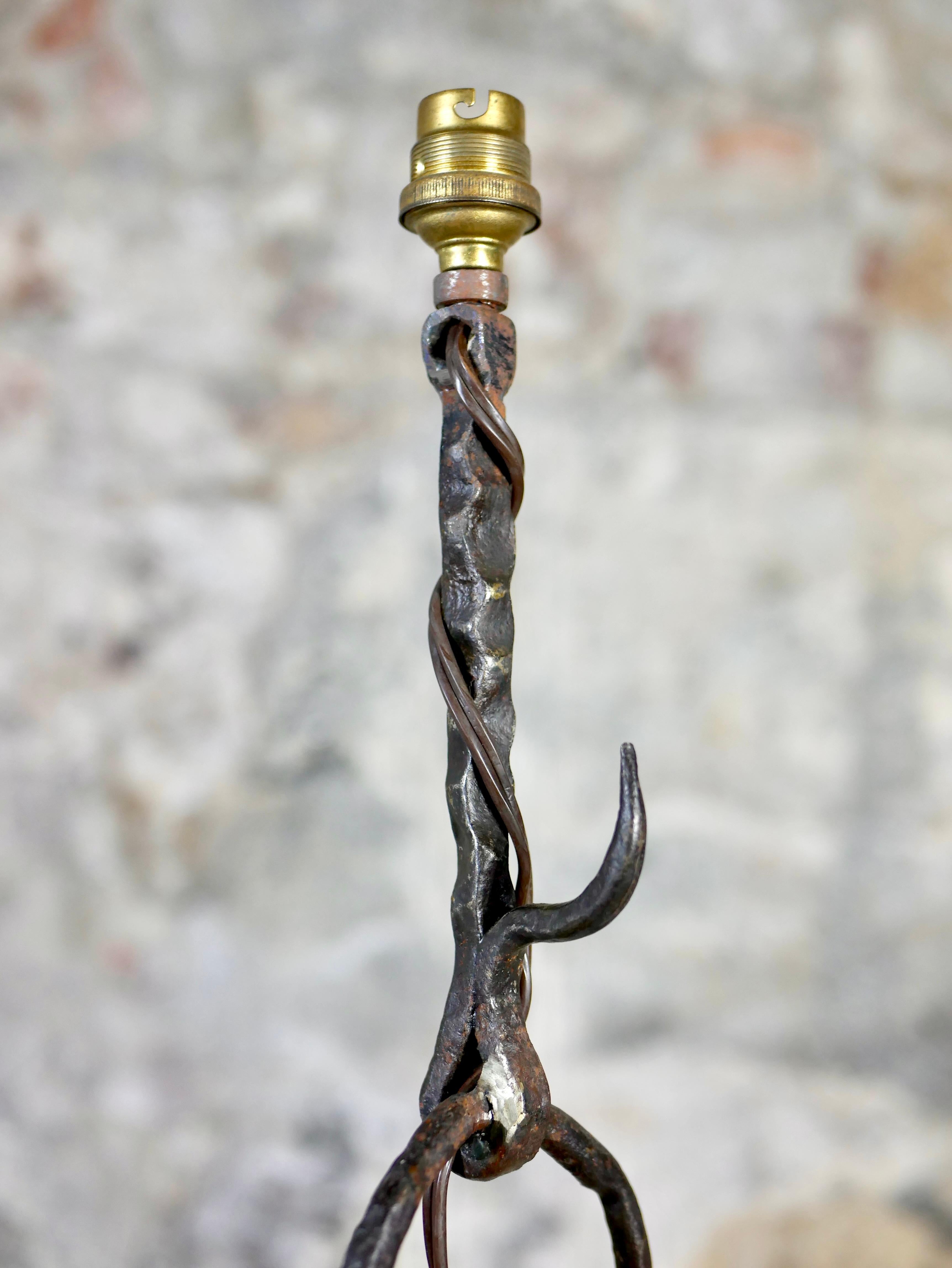 Mid-20th Century Brutalist wrought iron floor lamp, anonymous work from France, 1960s For Sale