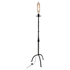 Brutalist wrought iron tripod floor lamp