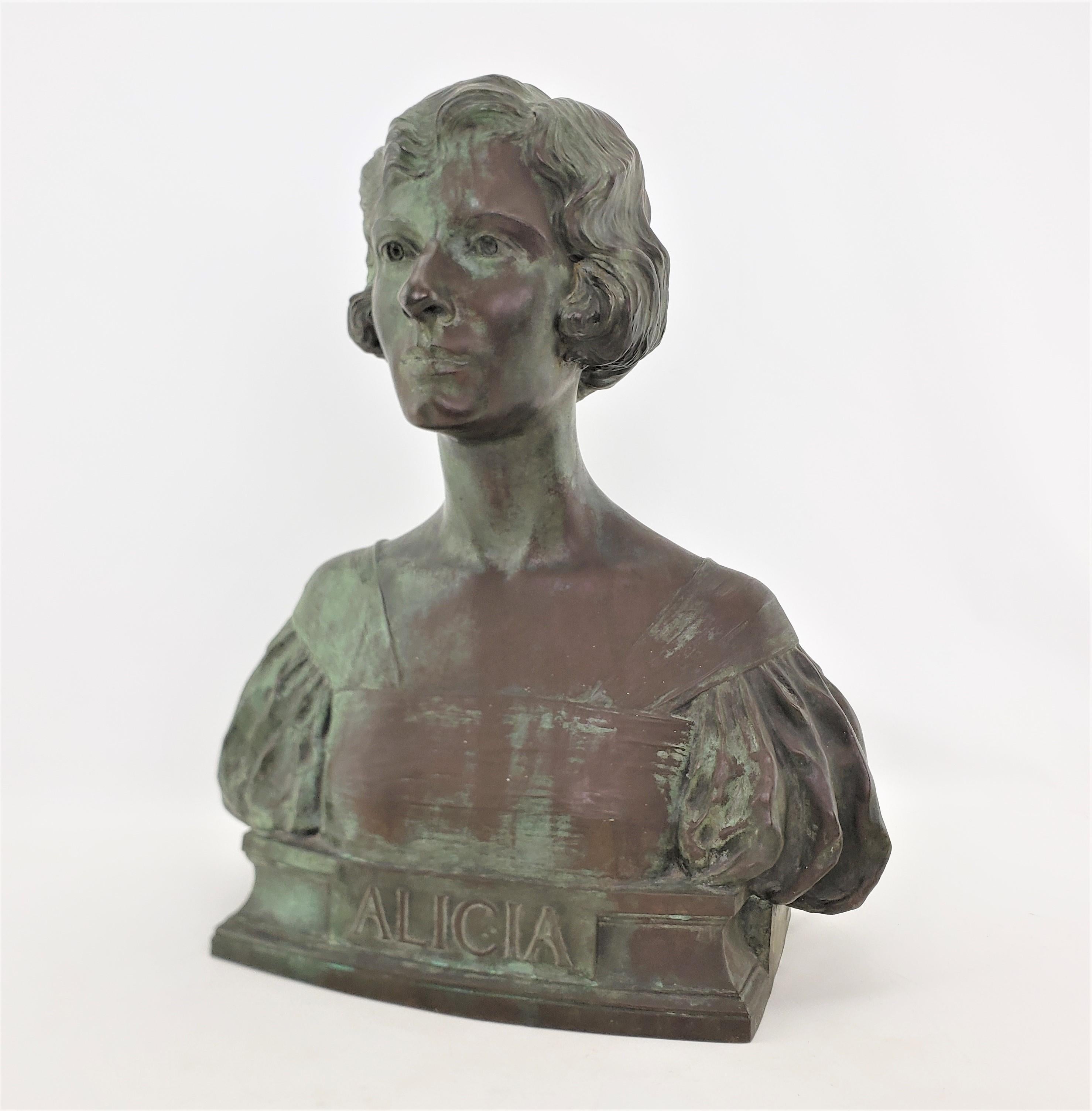 This extremely well executed antique bronze bust was done by world renowned sculptor Percy Bryant Barker of the United States and dates to 1922 and done in the period Art Deco style. The bust is composed of cast bronze with a 'verdigris' patination,