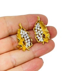 BSK signed vintage gold tone rhinestones leaf designer clip on earrings