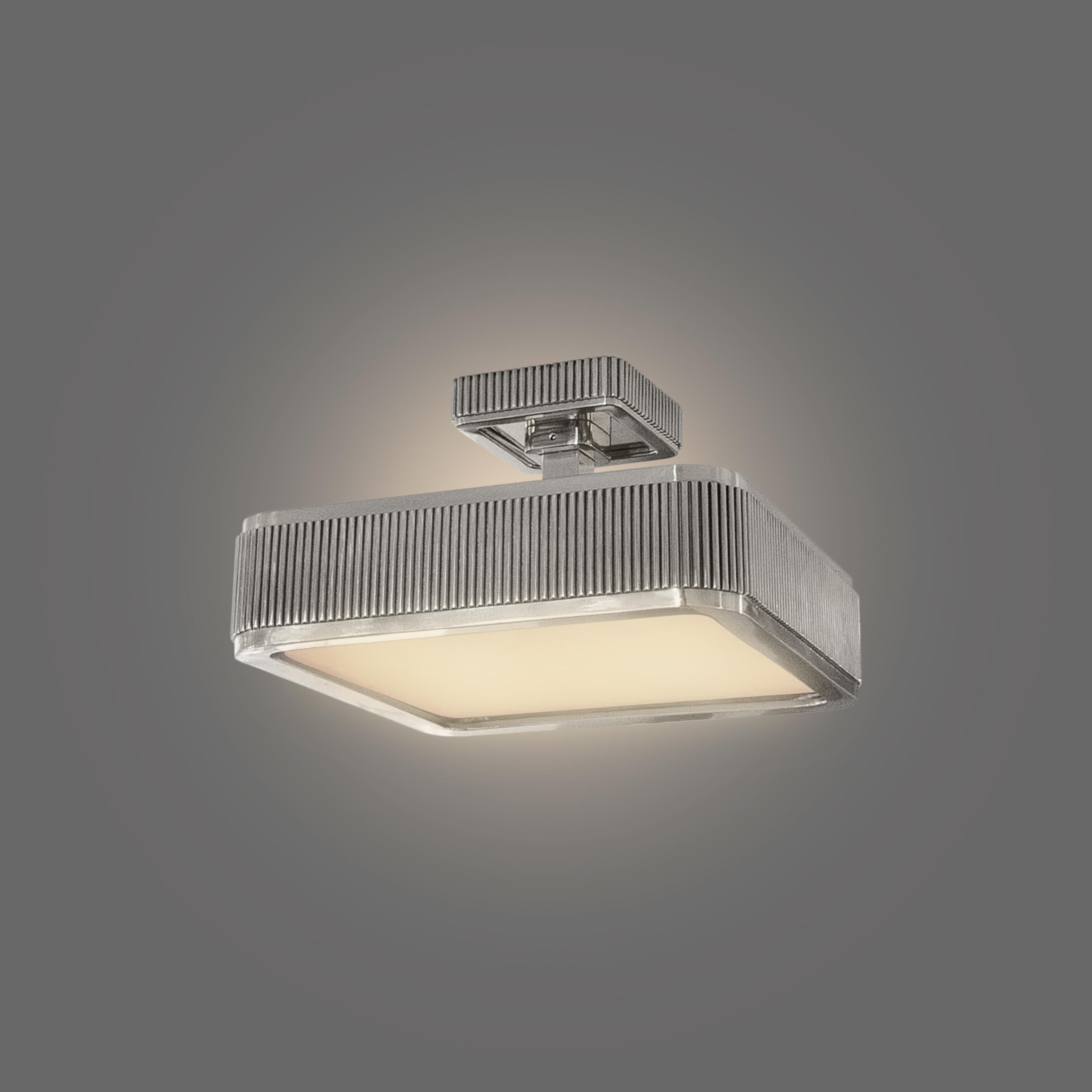 Semi flush mount with rock crystal panel. Polished nickel finish.

Four sockets installed. 160w total. 
Custom size and finish upon request. Please message for availability and lead time.

Created by Phoenix.

