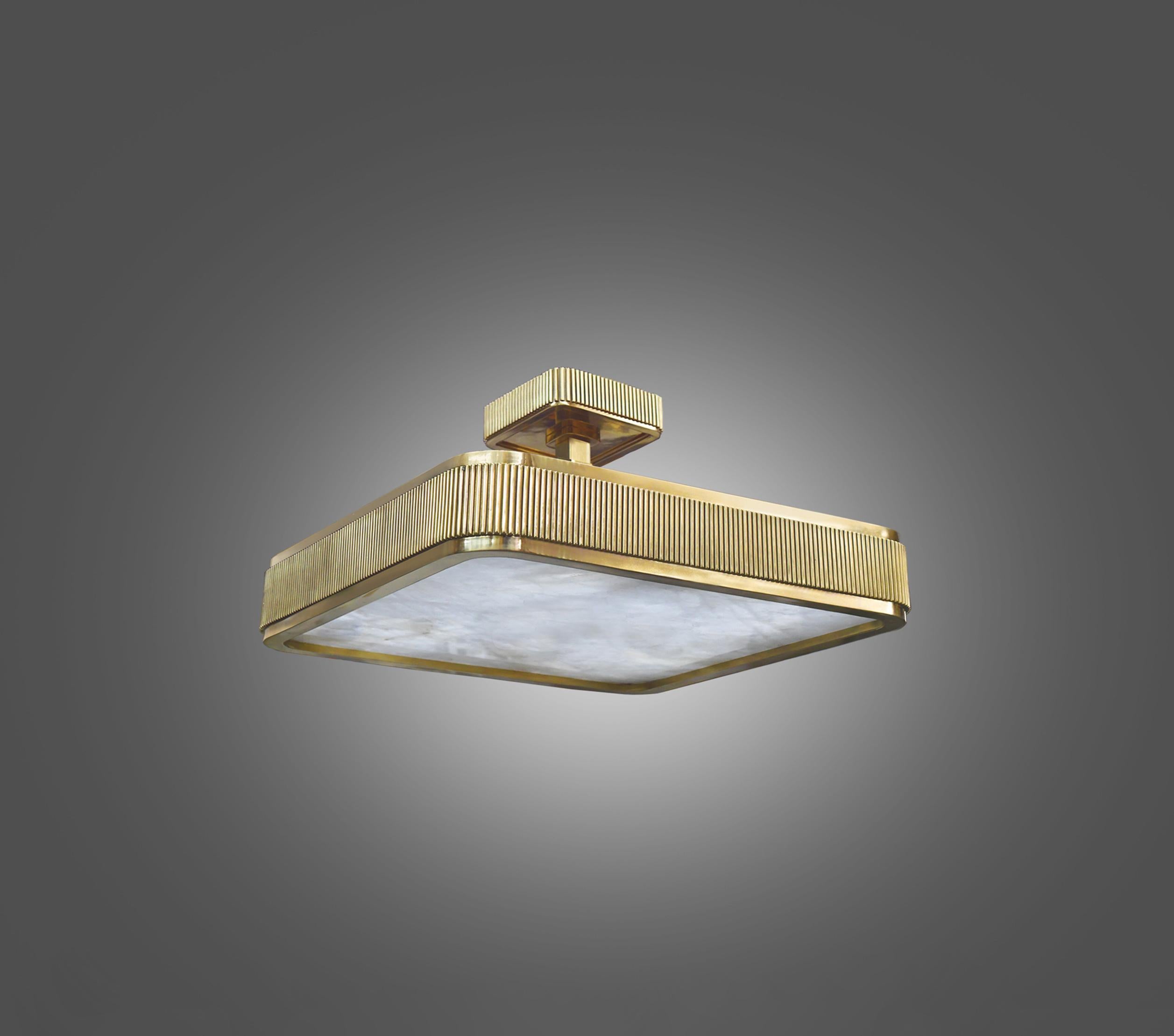 Elegant form polished brass frame with rock crystal panel, BSO rock crystal semi flushmount. Created by Phoenix, NYC.

Height can be adjustable.

Lutron dimmer system. 
Each fixture installs four E26 base sockets. 
Use four 60W each LED light