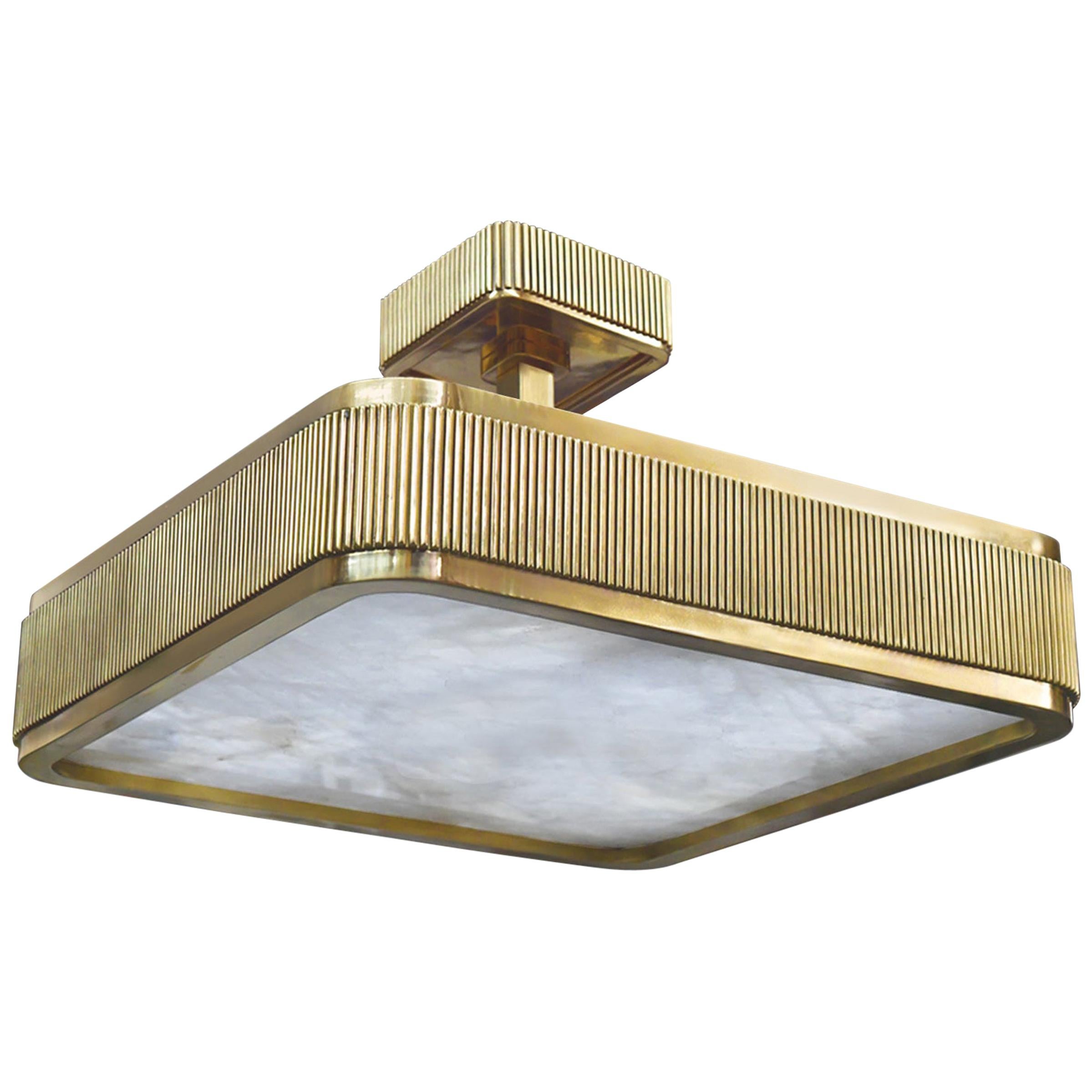 Elegant form fixture with polished brass frame and rock crystal panel, BSO rock crystal semi flush mount created by Phoenix, NYC.

Height can be adjustable.

Lutron dimmer system. 
Each fixture installs four E26 base sockets. 
Use four 60W each LED