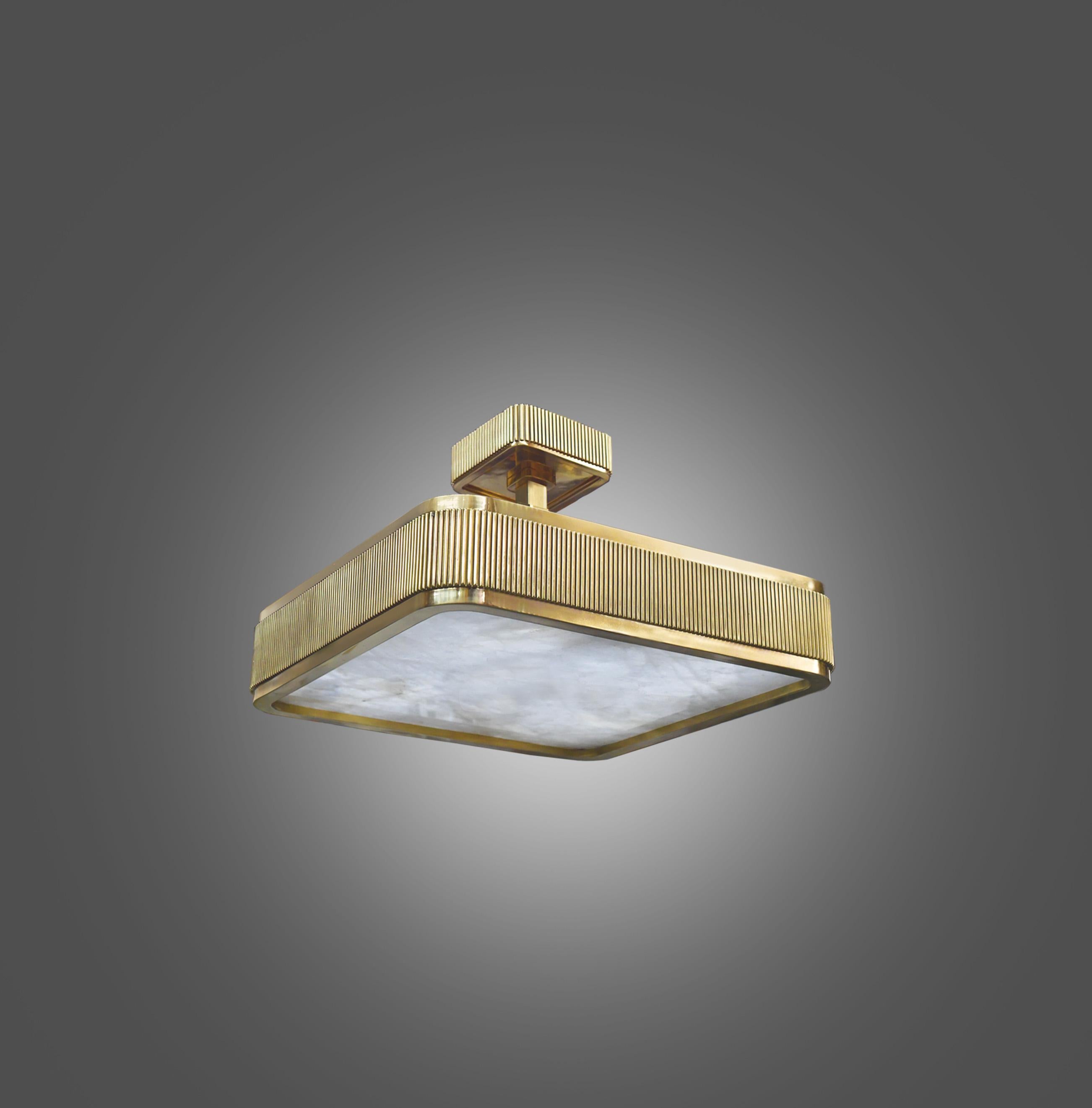 elegant forms fixture with polished brass frame and rock crystal panel, BSO rock crystal semi flush mount created by Phoenix, NYC.
Custom size and metal finish upon request.
Height can be adjustable.