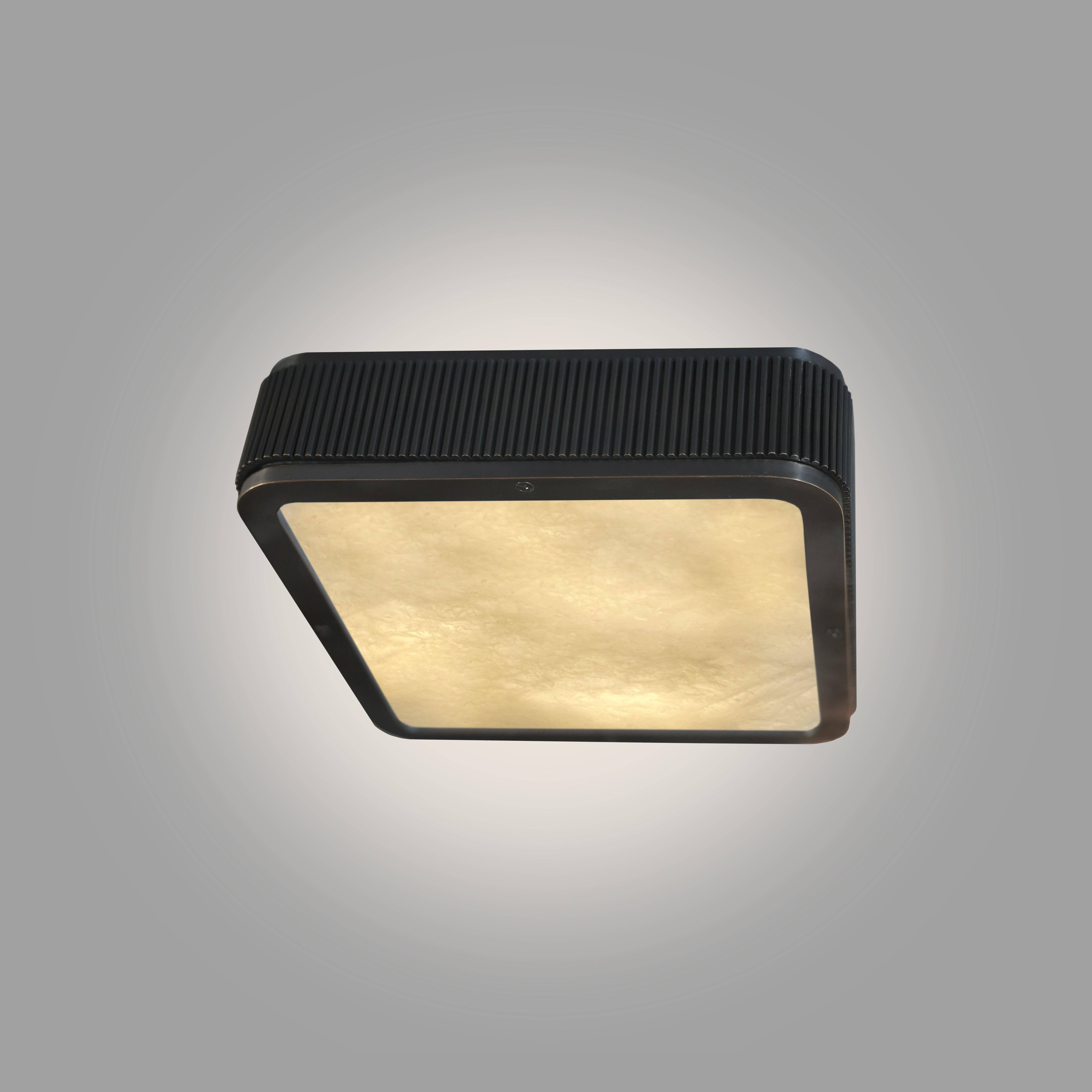 Flush mount with aged brass frame and rock crystal panel. Three E12 sockets installed, 180w total.
Custom size and metal finish upon request. Please message for availability and lead time.

Created by Phoenix.
