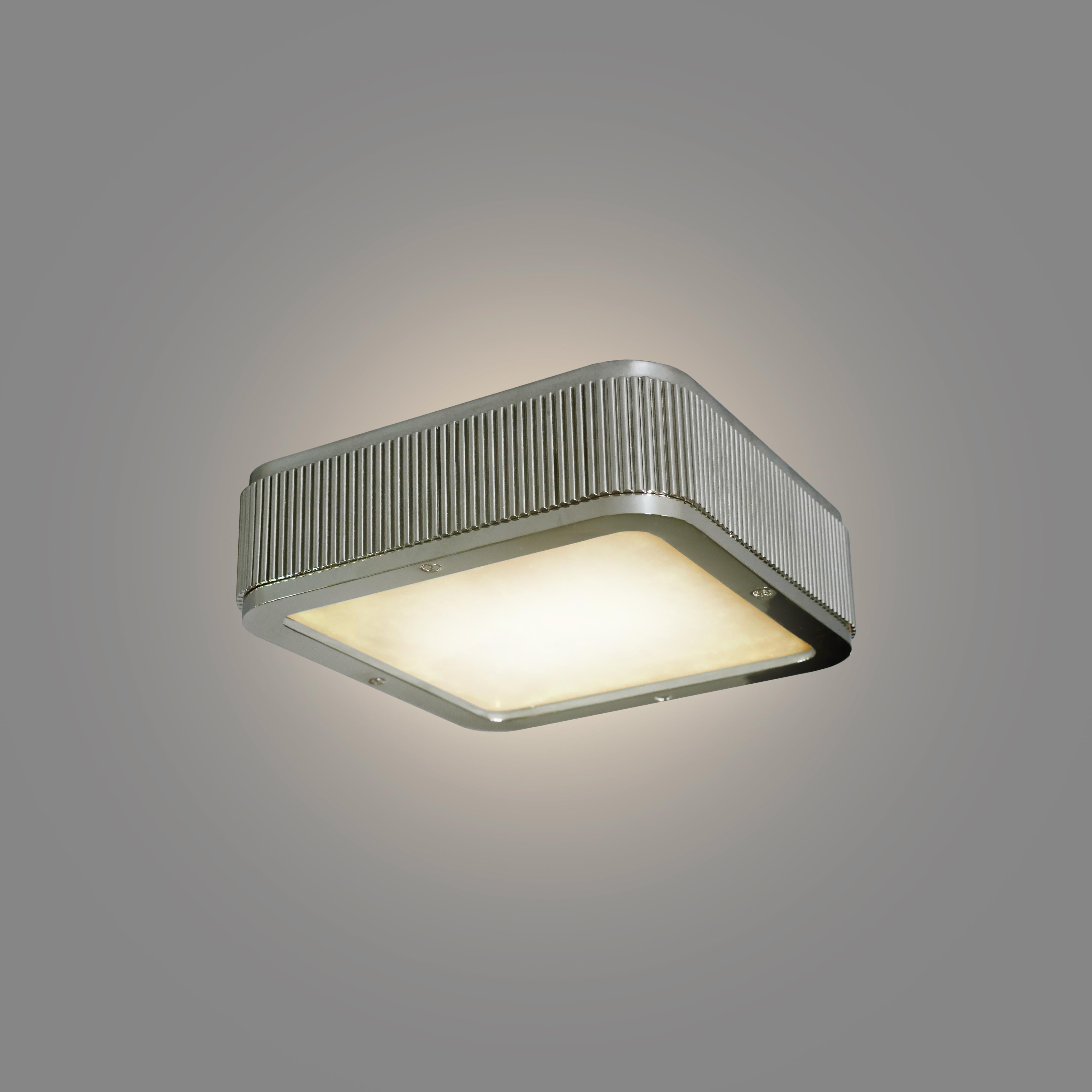 BSO8 flush mount with rock crystal panel and a polished nickel frame.
Three E12 sockets installed, 180w total.
Custom size and metal finish upon request. Please message for availability and lead time.

Created by Phoenix.