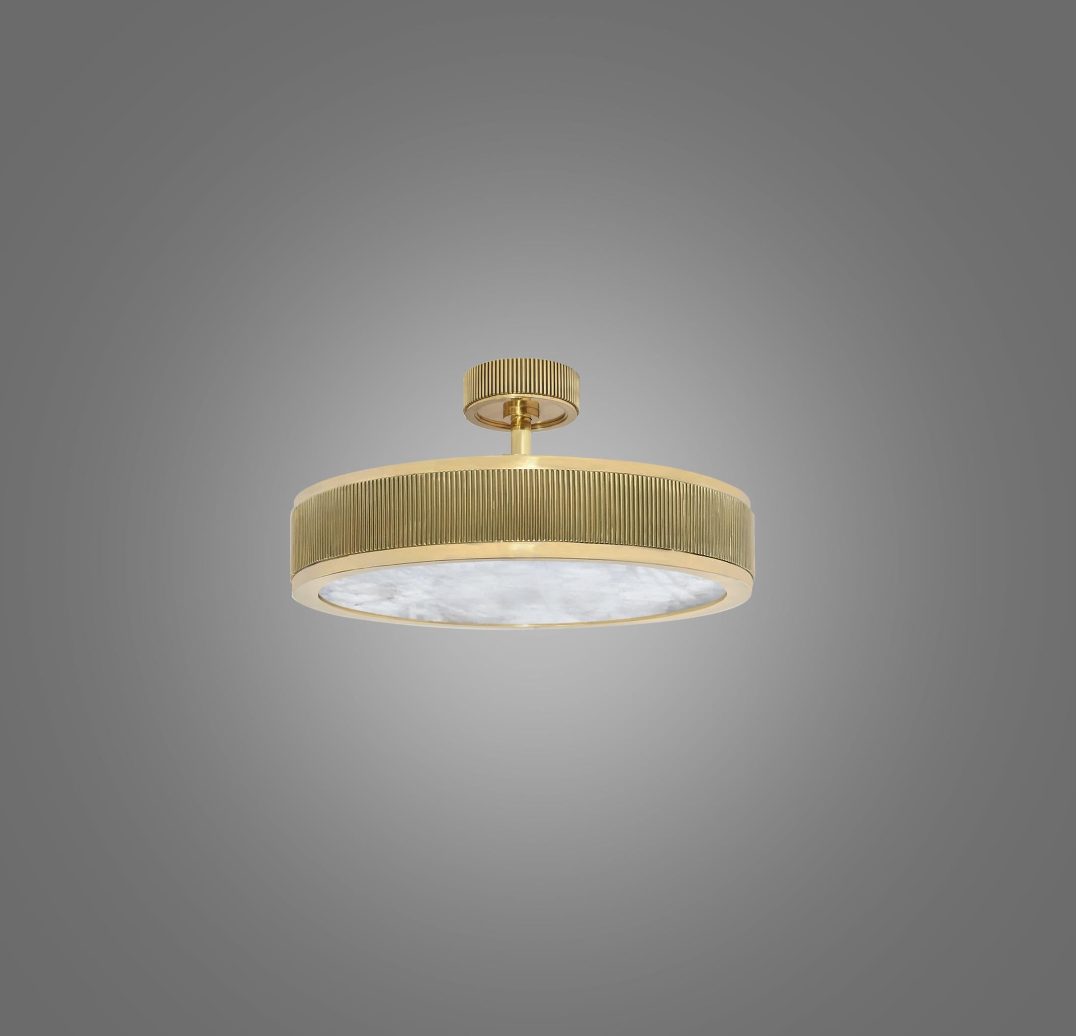Rock crystal semi flush mount with polished brass frame. Created by Phoenix Gallery, NYC.

Height can be adjustable.
