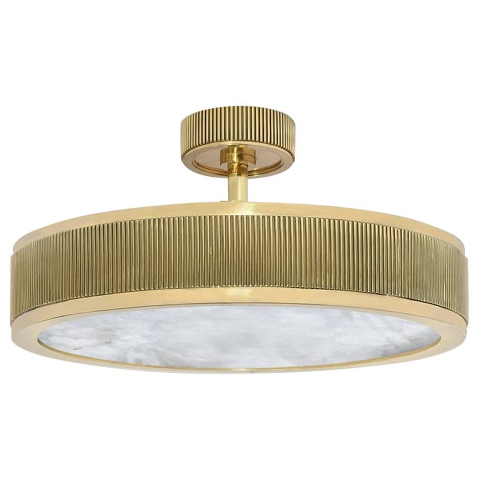 Rock crystal semi flush mount with polished brass frame. Created by Phoenix Gallery, NYC.

Height can be adjustable.
The height of the brass frame is 4