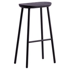 Tabouret de bar en bois d'acacia noir brut Buacheen avec pieds en fer revêtu de poudre noire