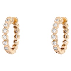 Boucles d'oreilles créoles en or 14 carats avec diamant de 0,17 ct