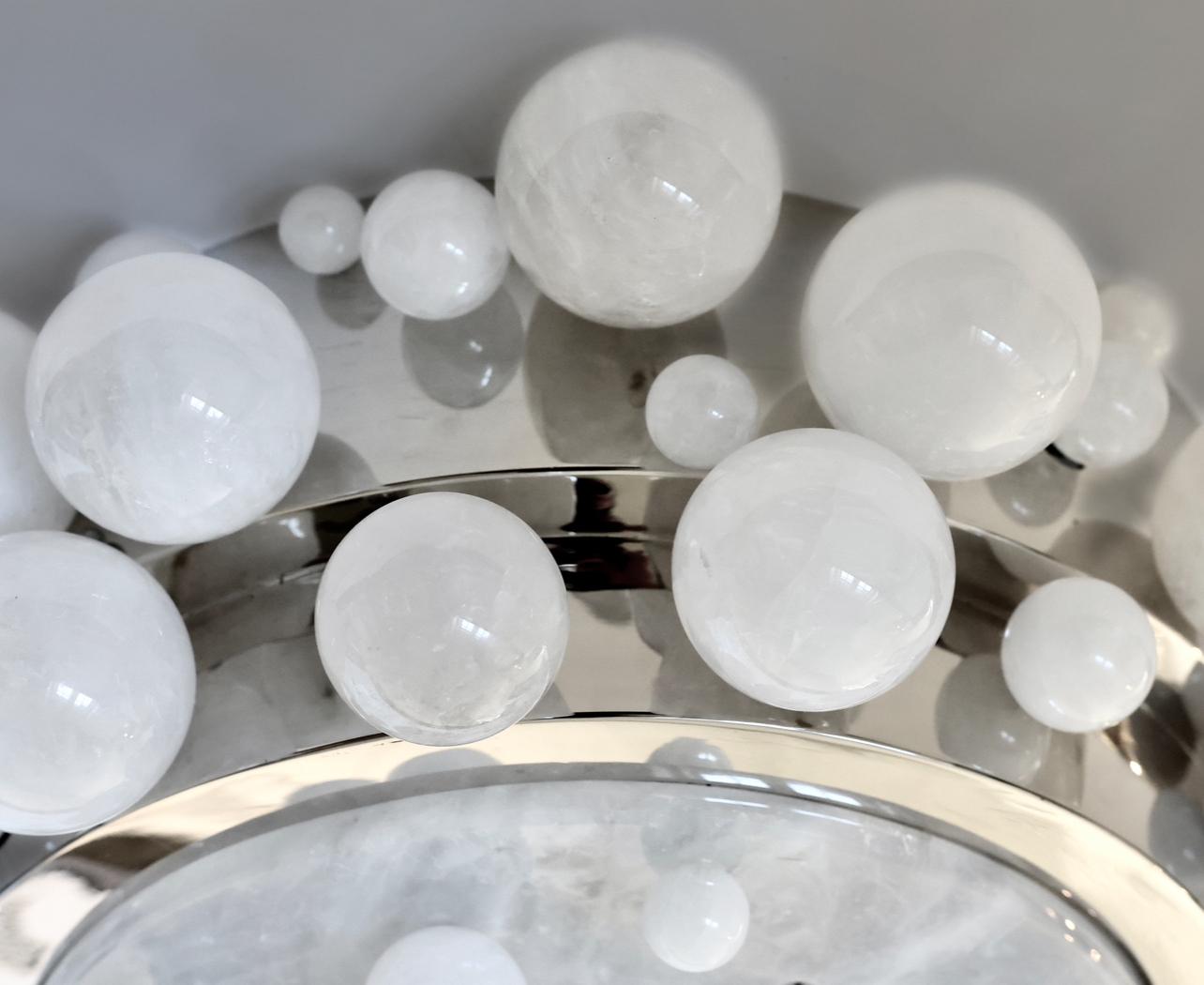 Rock crystal flush mount with polished brass finish and white rock crystal bubbles.

Created by Phoenix 

Three E26 sockets installed,320w total

Custom size and metal finish upon request.