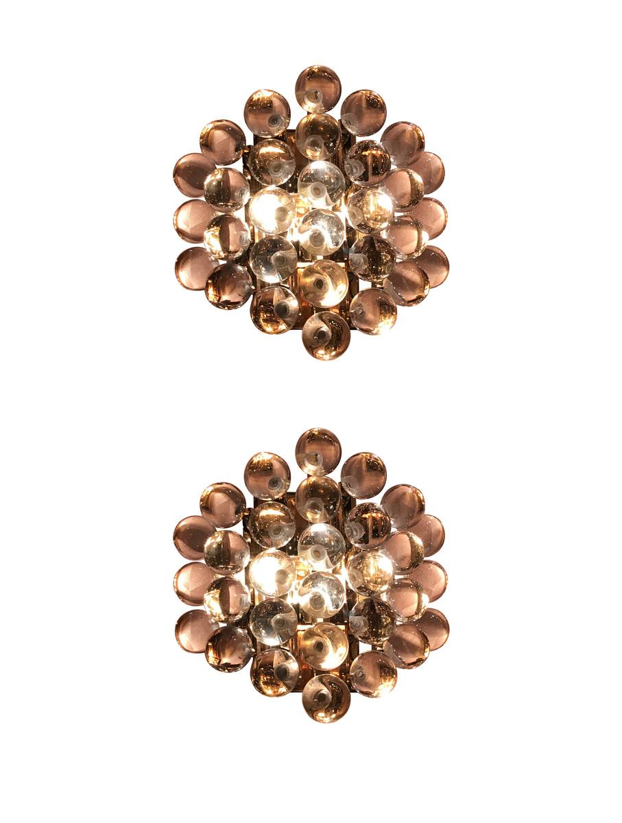 Contemporary Dutch cluster of mini crystal bubbles form a decorative pair of sconces.
Brass back plate.
ARRIVING SEPTEMBER
 