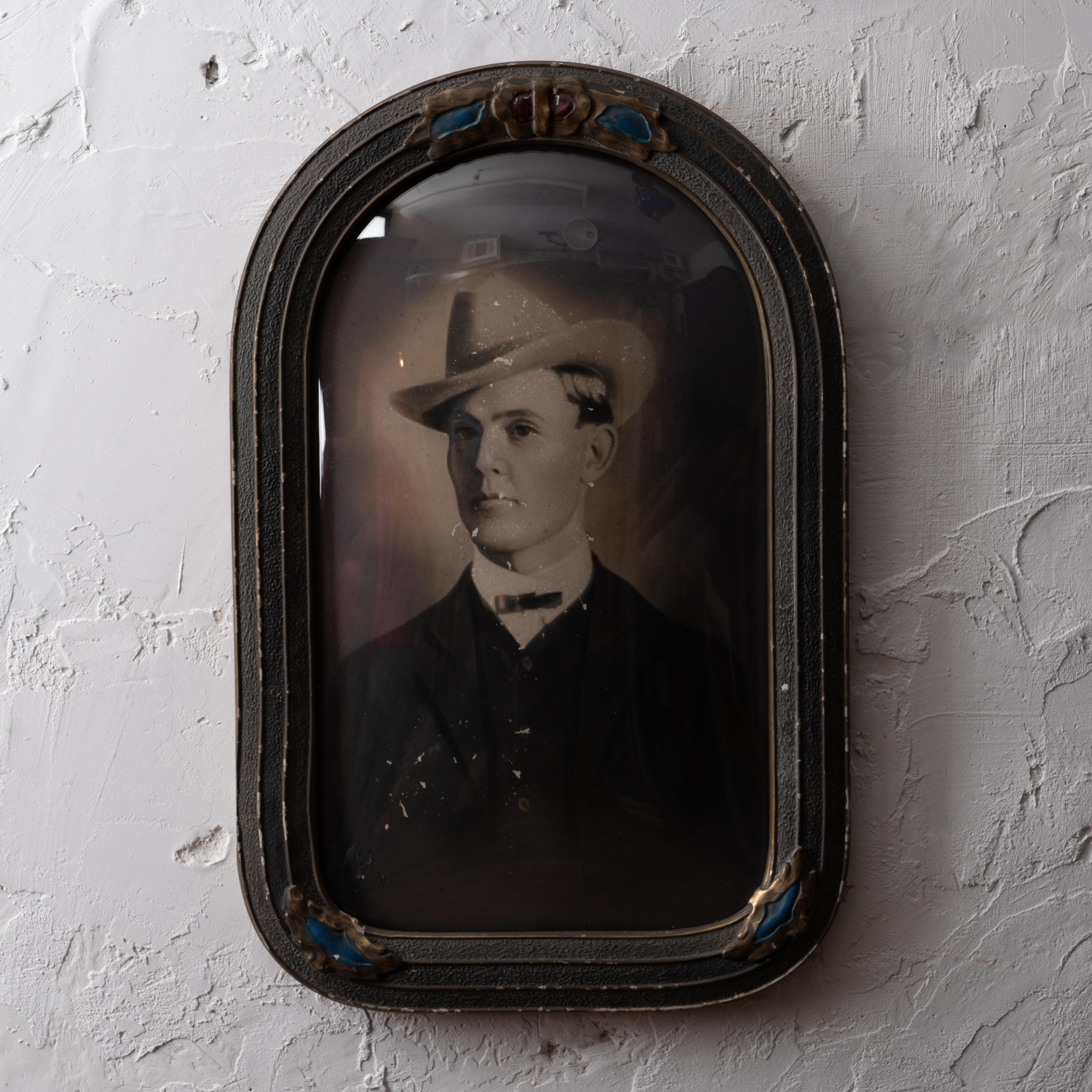 A bubble glass portrait photograph, circa 1920.

15 by 23 inches

