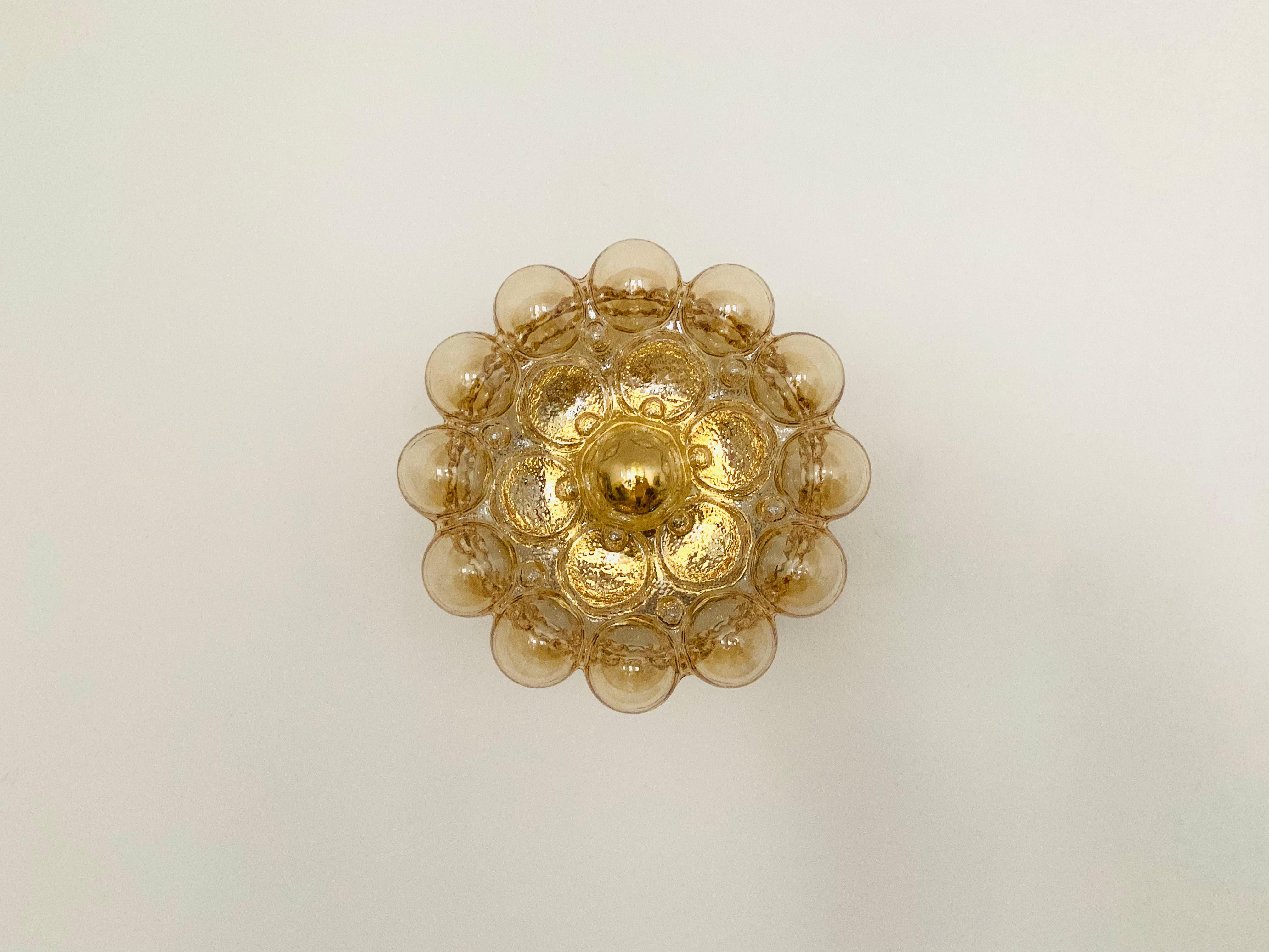 Exceptionally large and beautiful bubble glass wall or ceiling lamp from the 1960s.
Fantastic design and high quality workmanship.
The lamp impresses with its imposing size and the spectacular play of light.

Manufacturer: Glashütte