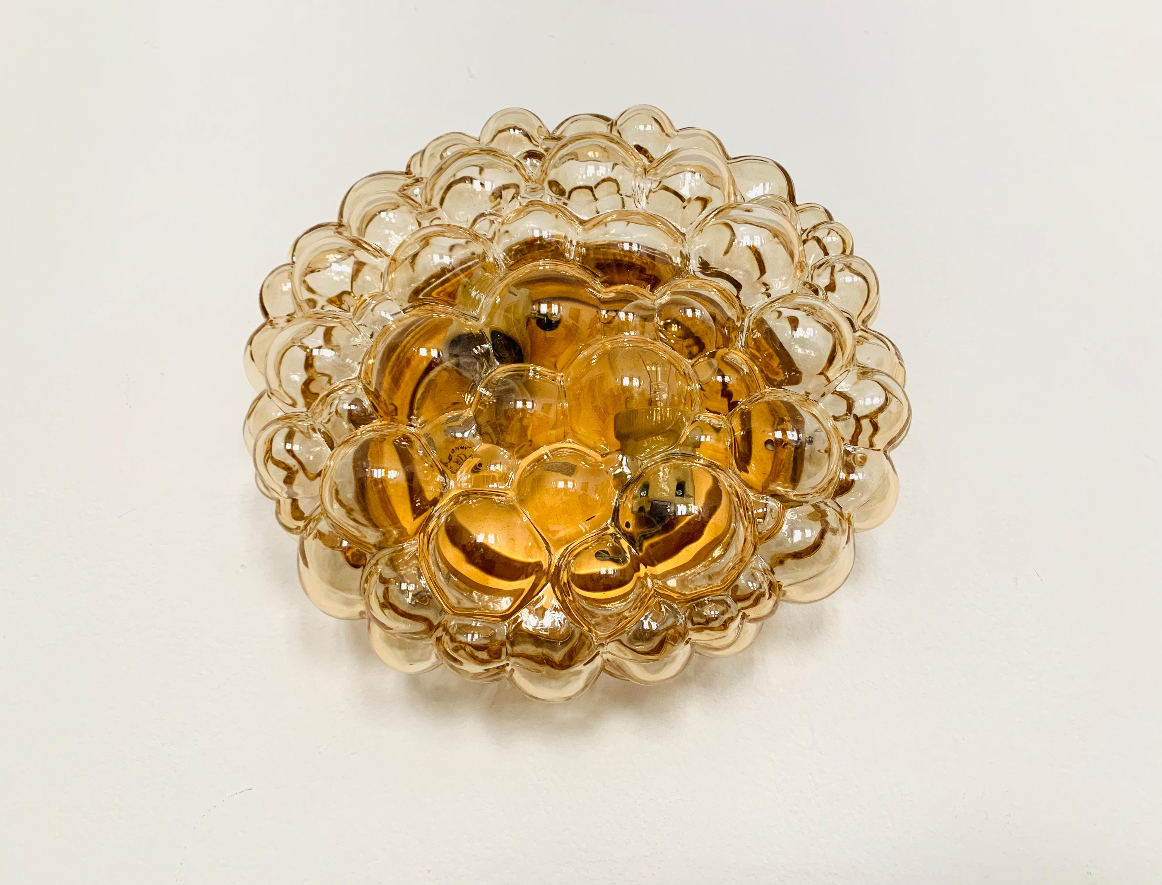Exceptionally large and beautiful bubble wall or ceiling lamp from the 1960s.
Fantastic design and high quality workmanship.
The lamp impresses with its imposing size and the spectacular play of light.

Condition:

Very good vintage condition with
