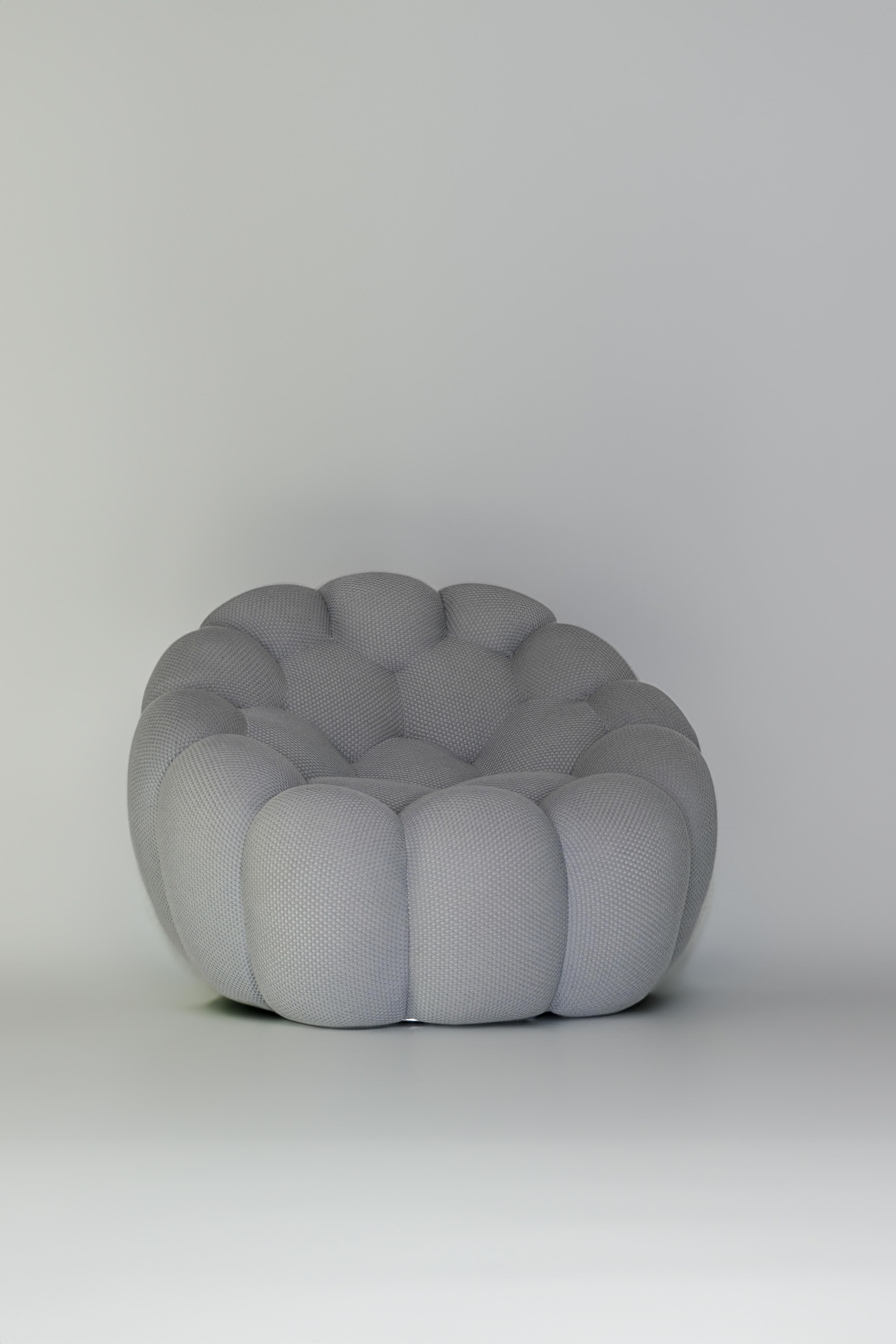 Bubble Pivoting Armchair designed by Sacha Lakic for Roche Bobois, 2016. Standing at the intersection of innovation and passion is the bubble, made by hand in Italy, it required the development of a novel fabric with elasticity stretching in all