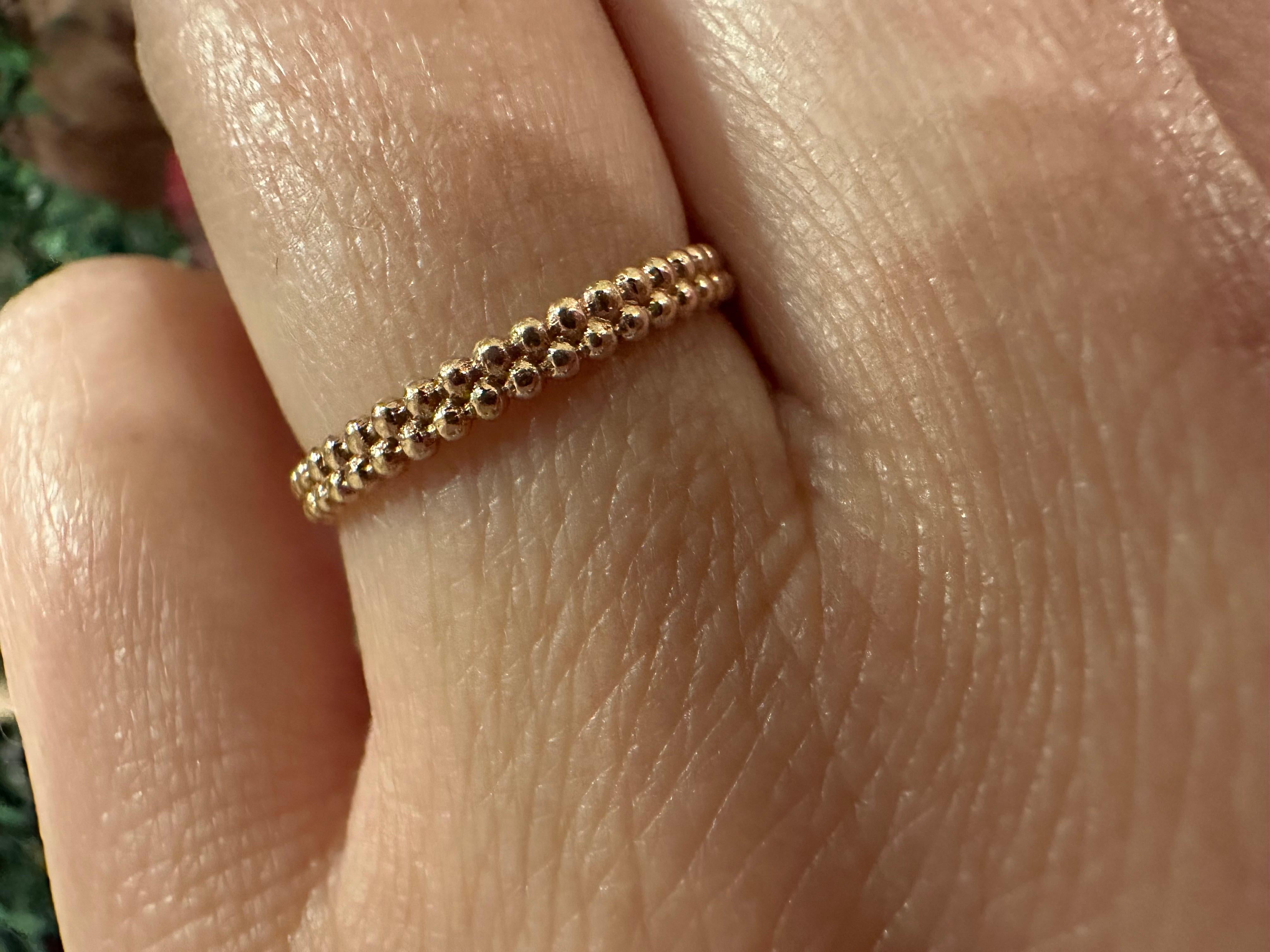 Bubble design plan gold ring size 6.5, it has a sizing bar at the back so it can be re-sized.

Metal Type: 14KT rose gold

Certificate of authenticity comes with purchase

ABOUT US
We are a family-owned business. Our studio in located in the heart