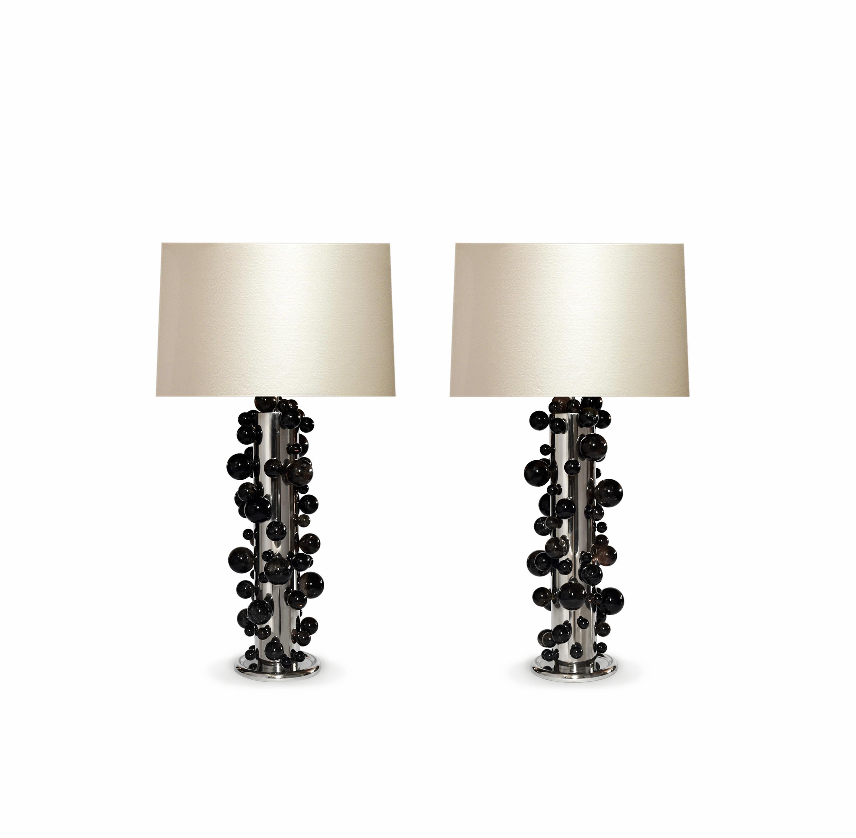 A tall pair of luxury dark rock crystal quartz bubble lamps with nickel plating frames. Created by Phoenix Gallery, NYC.
Each lamp installed two sockets.
To the top of the rock crystal 25.75