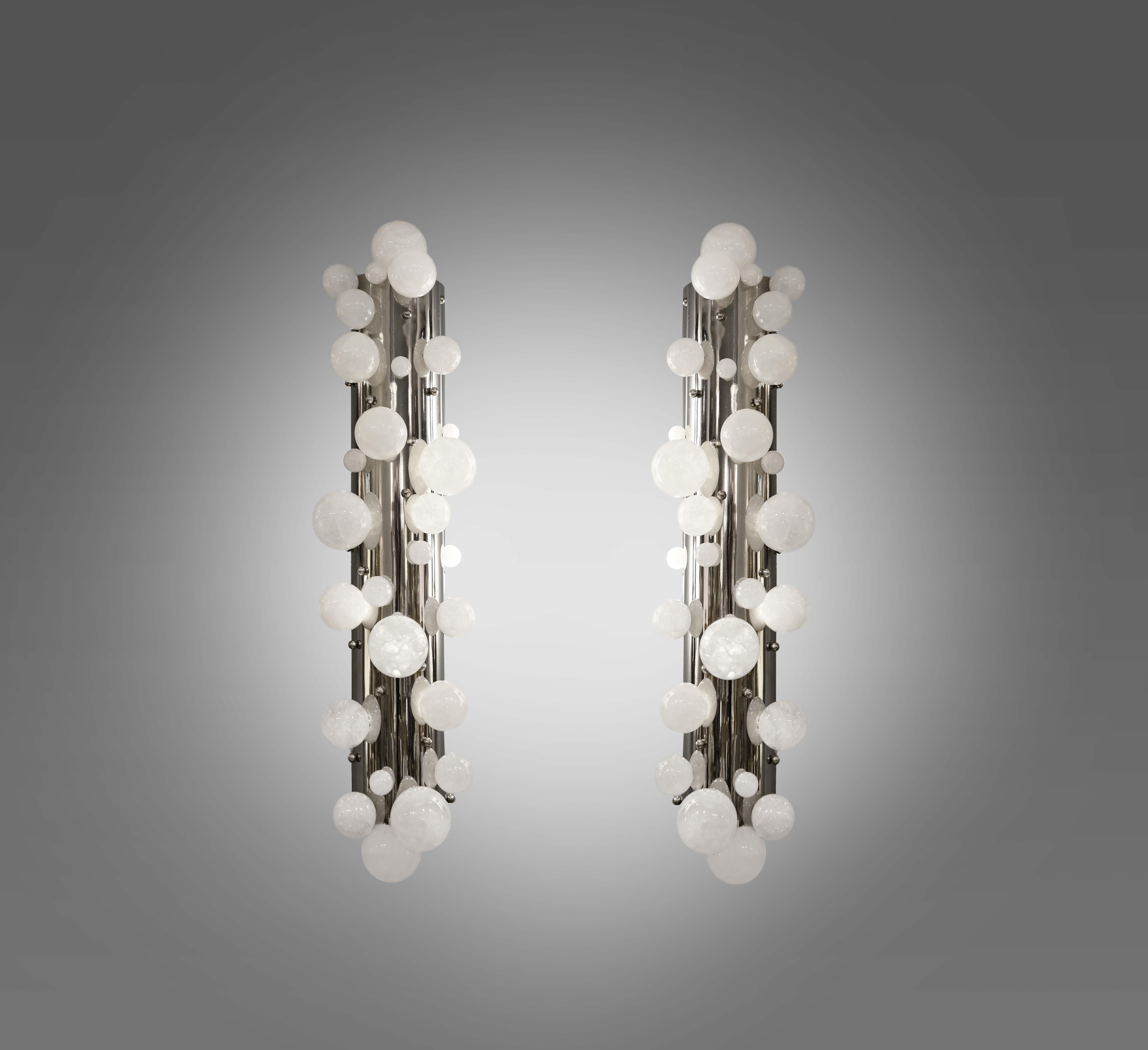 Pair of bubble rock crystal sconces with the polish nickel mounted. Created by Phoenix gallery NYC.
Each sconce installed two sockets, 160 W max. 