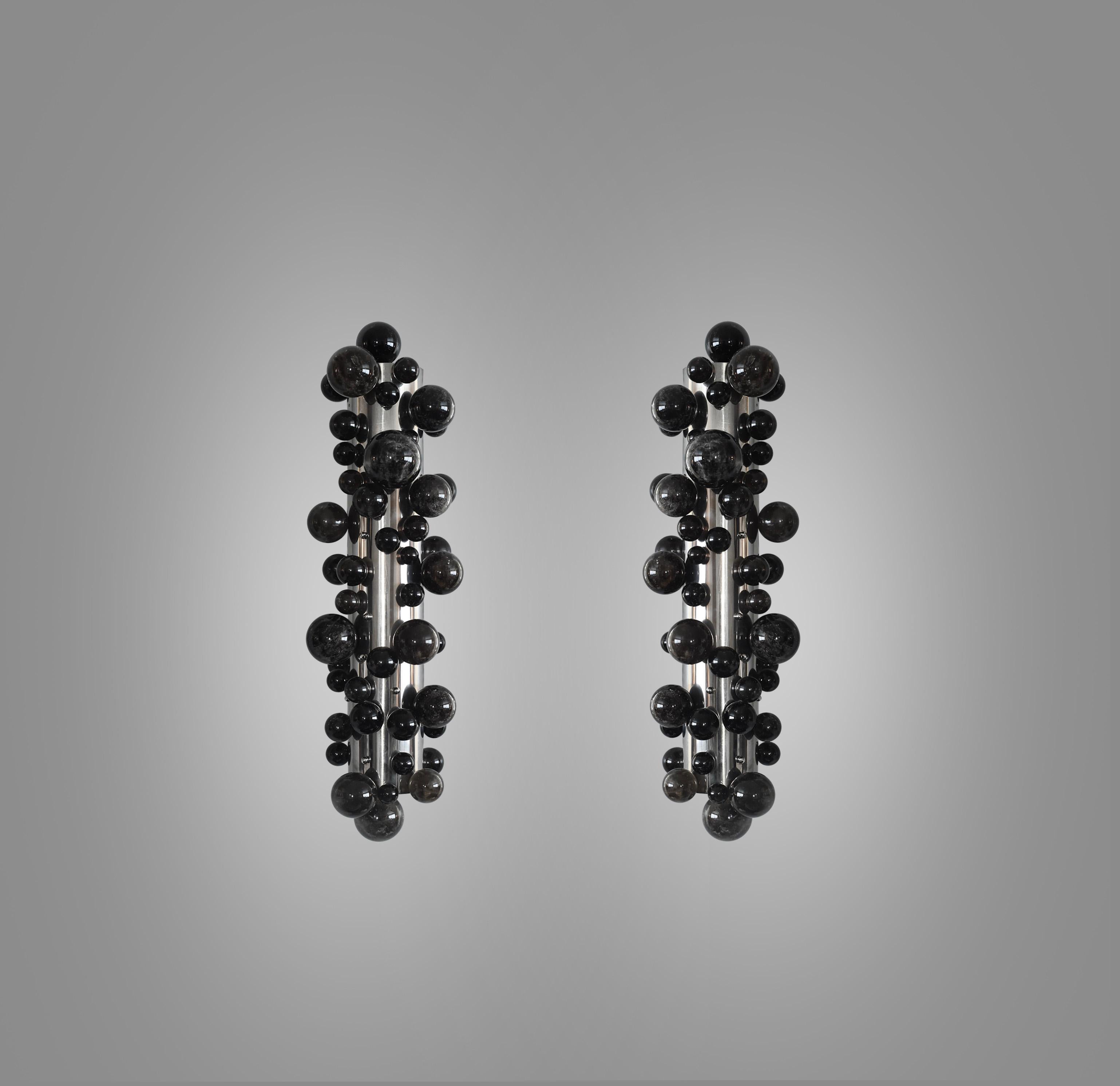 Pair of dark bubble rock crystal sconces with the nickel plating finishes. Created by Phoenix gallery NYC.
Each sconce installed four sockets. Use four 60w LED warm light bulbs. Total 240w max. Light bulbs included.
Custom size upon