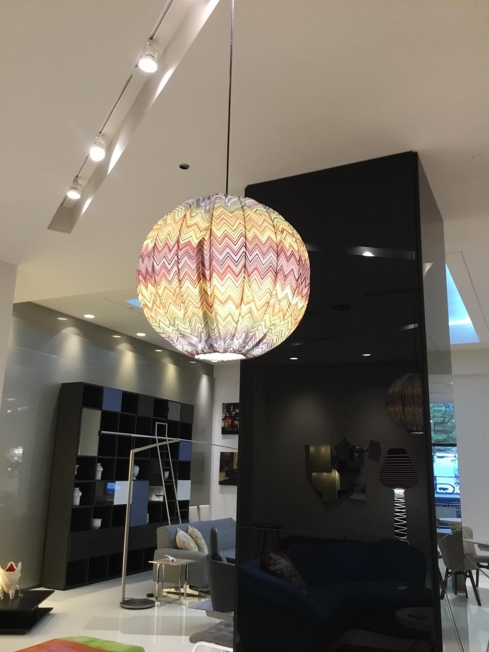 Bubble lamp in Missoni Home in Jarris 159 multi colored zig zag pattern. Removable zip fabric cover. Power coated steel rod structure. Black wire and canopy. 

Dimensions 
23.6 