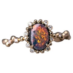 Bague de fiançailles en or jaune 18 carats, opale noire et diamant en forme de bulle thé