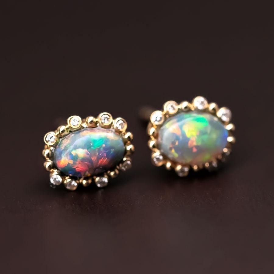 Bubble Tea Design Australian Black Opal Diamond Stud Earrings in 18K Yellow Gold.


Free Domestic USPS First Class Shipping! Free Gift Bag or Box with every order!

Opal—the queen of gemstones, is one of the most beautiful gemstones in the world.