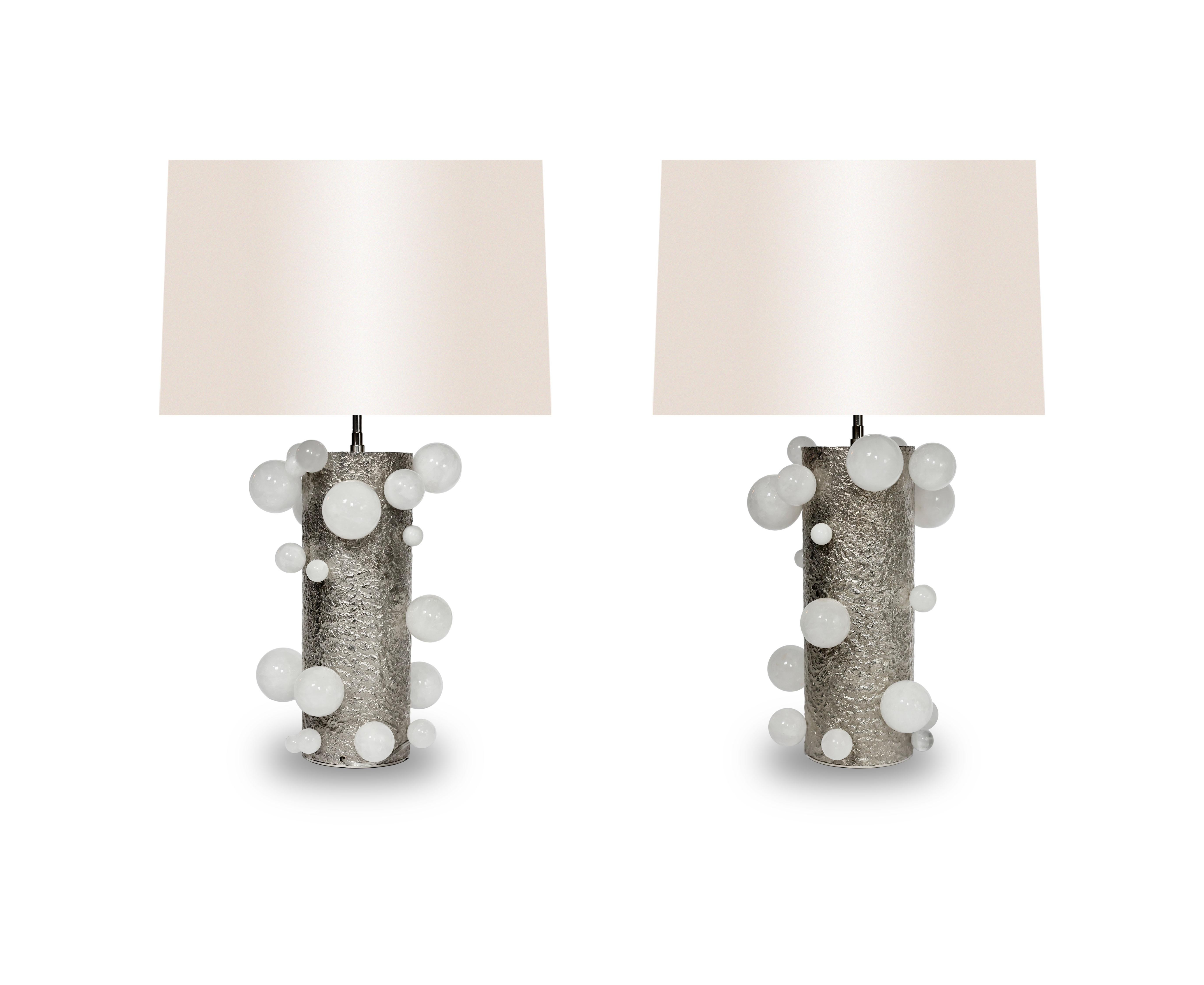 Pair of rock crystal bubble lamps with hammered nickel finish bases

Created by Phoenix.

Lampshades are not included.