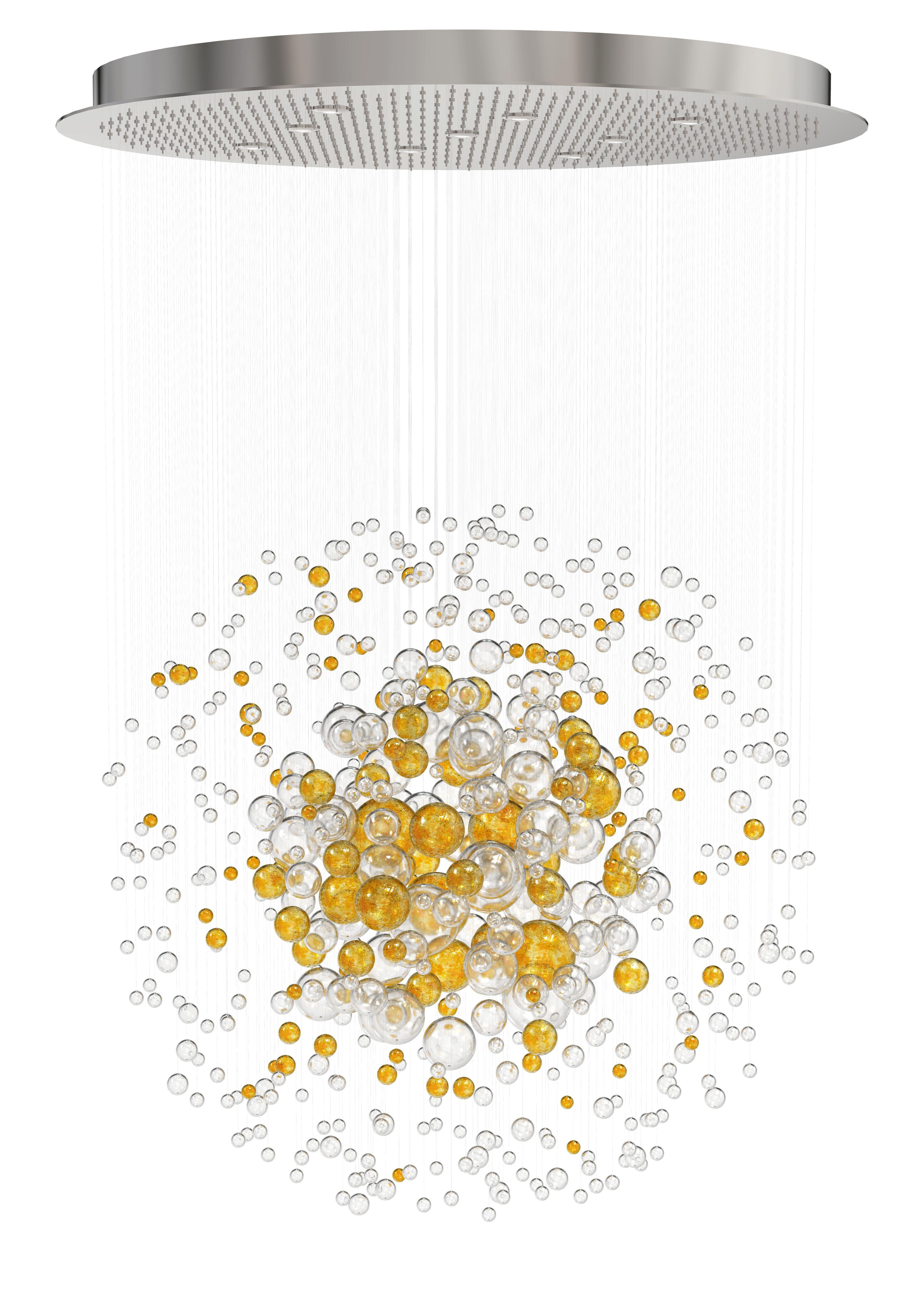 Bubbles in Space is an icon of organic timeless design.
This ethereal object is a rendition of an explosion of bubbles in space which transports the viewer to an unreal world of pure fascination. It evokes bubbles in champagne fizzing through the
