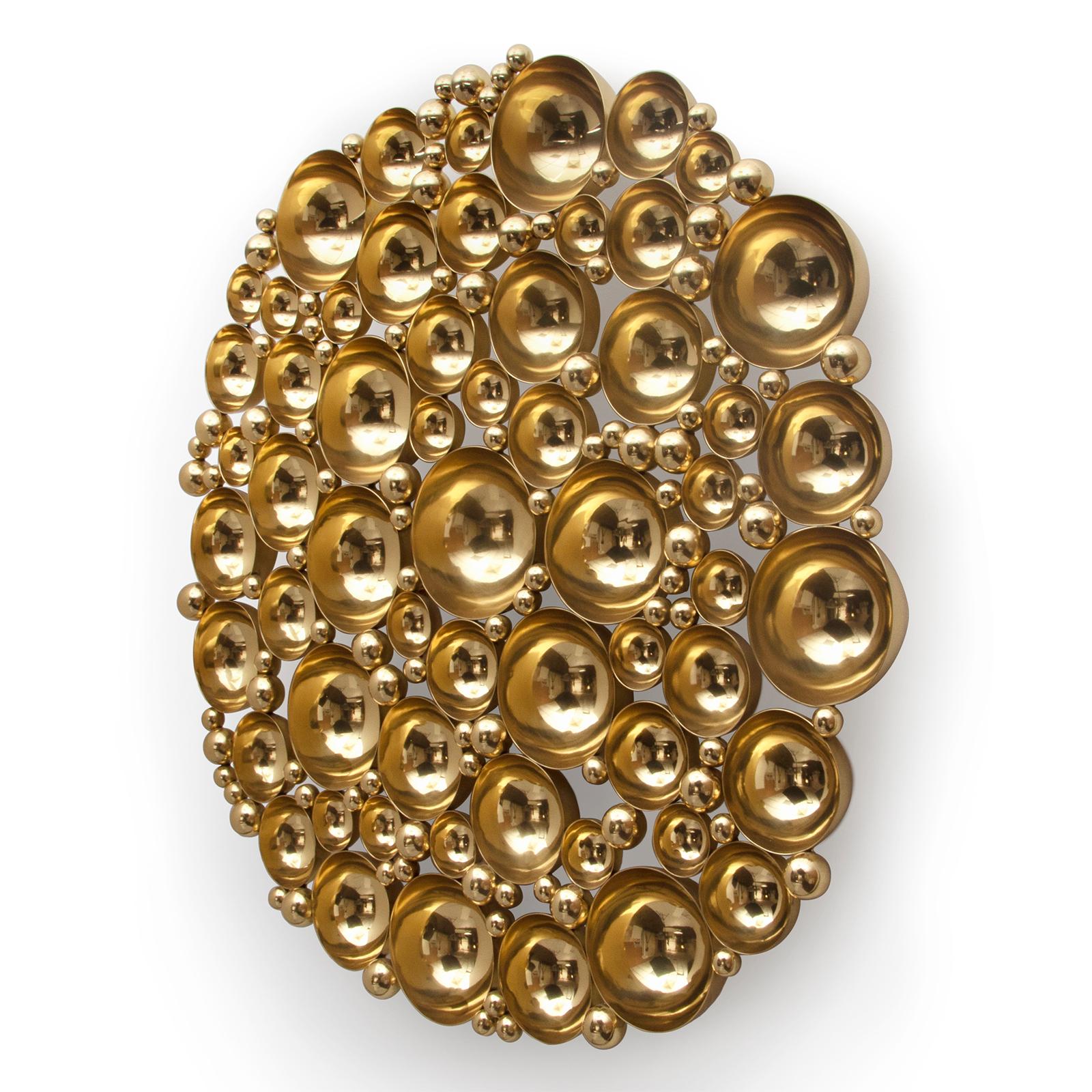 Mirror Bubbles with all structure in polished aluminium,
assembled concave half spheres in gold finish.