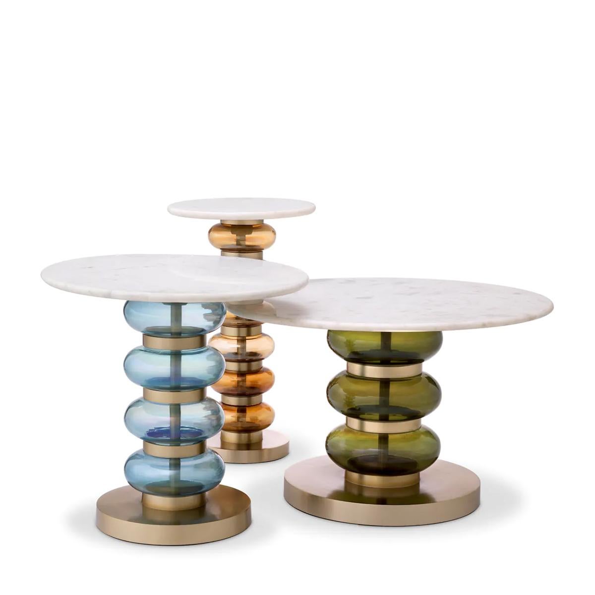 Side Table Bubbles Set of 3 with solid brass in vintage finish,
composed of 3 side tables in orange and blue and green glass,
with white marble table top. dimensions of each:
A/ Diameter61xH40cm.
B/ Diameter46xH44,5cm.
C/ Diameter30xH54cm.

