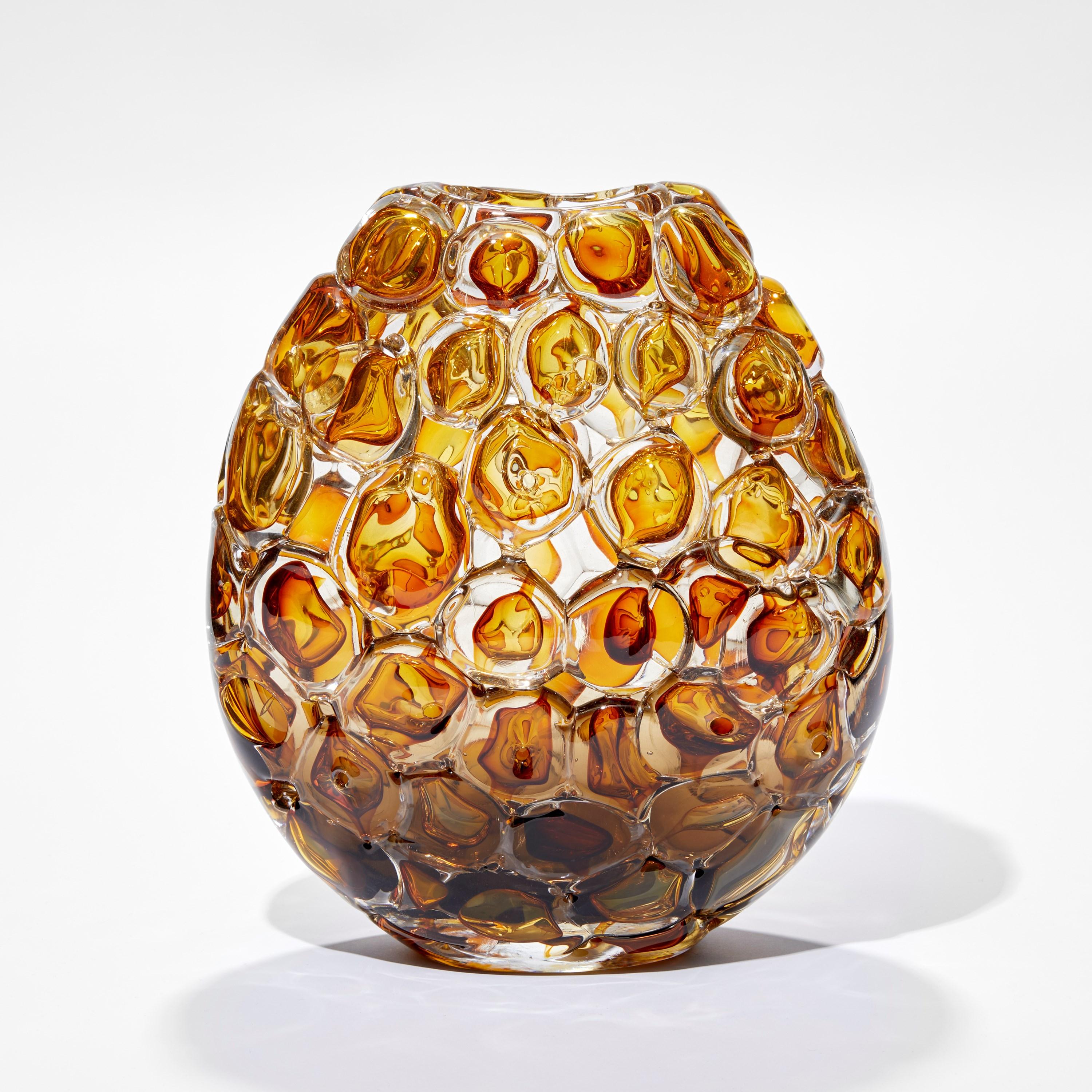 'Bubblewrap in Olivin Ombre & Aurora' is a handblown and sculpted vase created from glass by the British artist, Allister Malcolm.

Playful yet elegant, Malcolm has formed oversized bubbles on the exterior of this handcrafted and blown piece. The